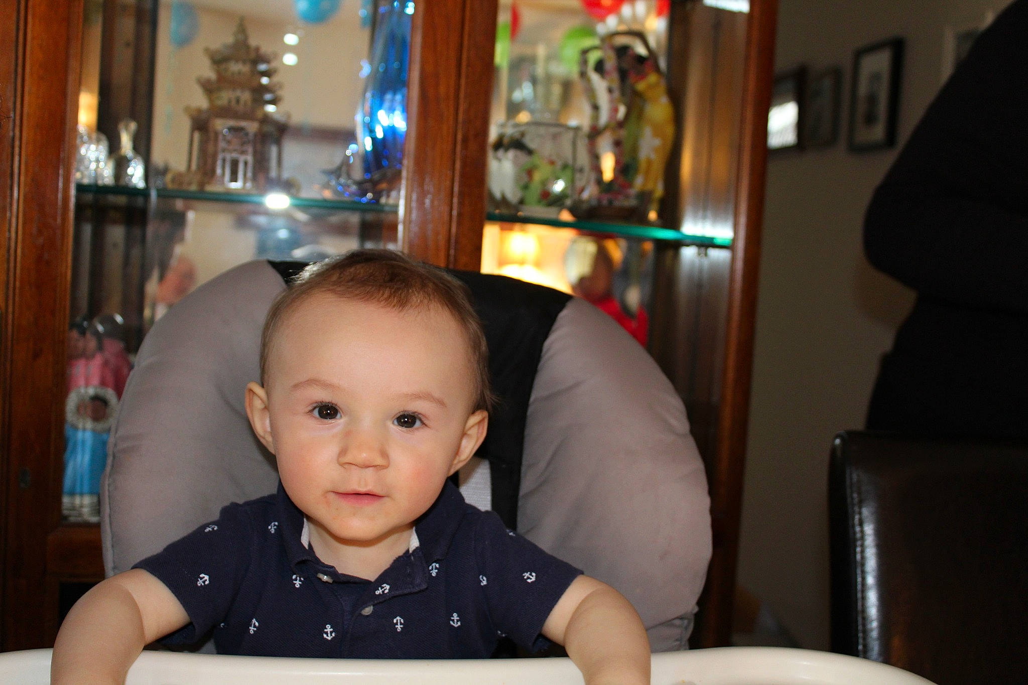 Cooper is registered to the contest to win money with this photo: baby, cheek, child, eating, person, sitting, skin, smile, toddler