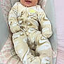 Liam joined the competition — help win amazing prizes! baby, infant, smiling, happy, onesie, nike, clothing, face, hair, cushion, baby_seat, indoor, child, cute, young, portrait, apparel, comfortable, relaxed, expression
