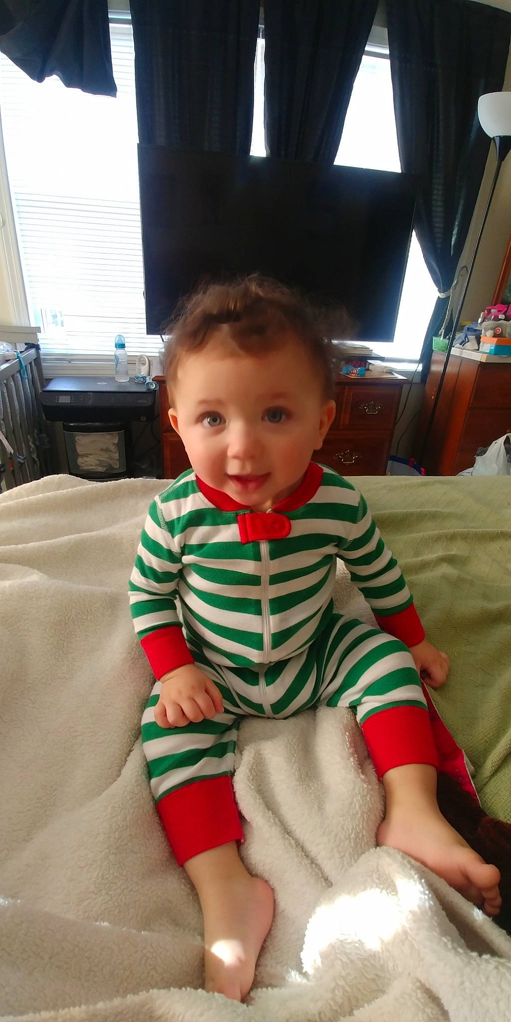 Thaddeus is registered to the contest to win money with this photo: baby, cheek, child, leg, person, sitting, skin, toddler