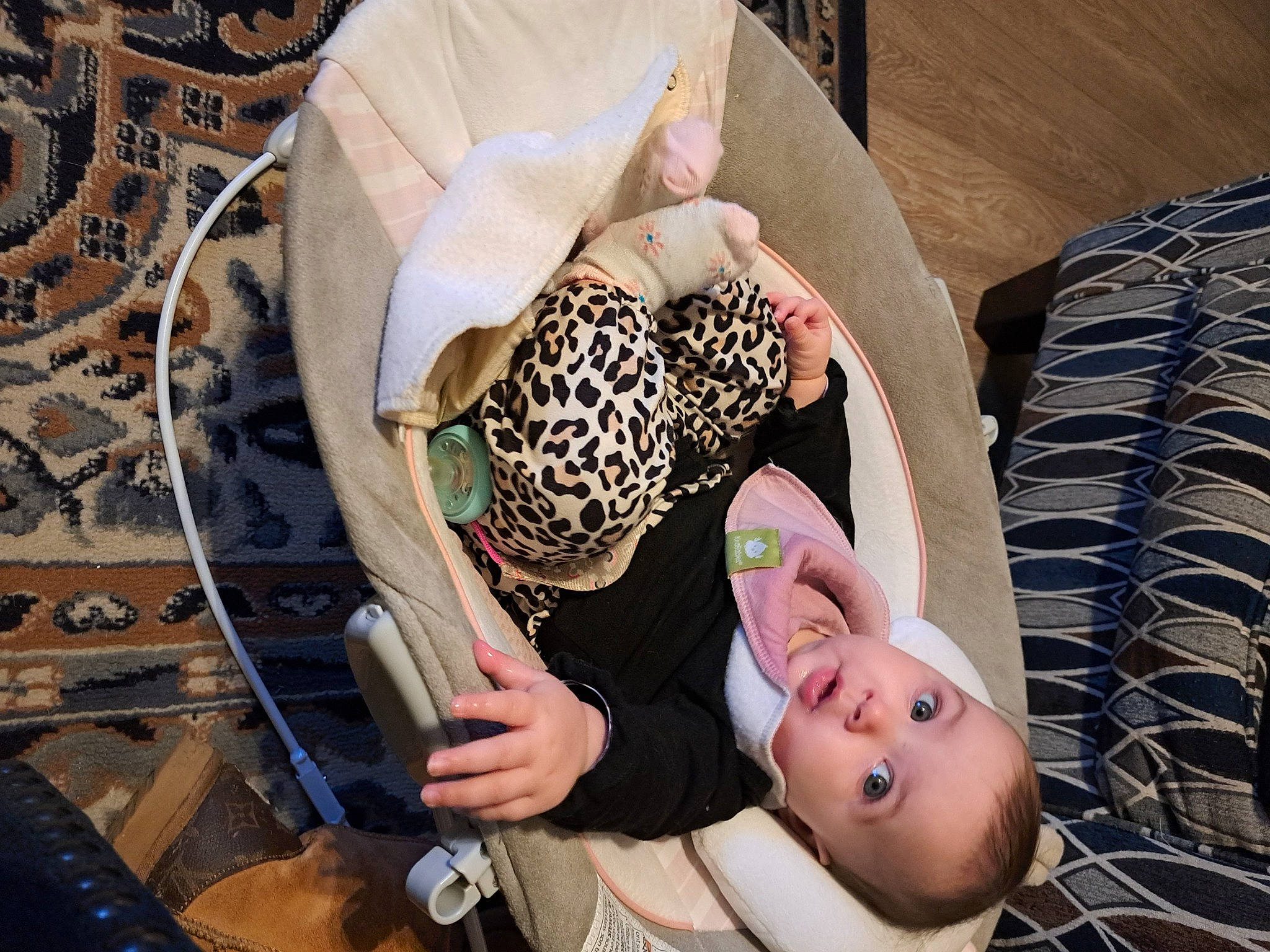 Xiamar is registered to the contest to win money with this photo: arm, baby, child, comfort, eyewear, fashion_accessory, finger, foot, fun, hand, hat, human_leg, pattern, person, sitting, sunglasses, surprise, textile, thigh, toddler