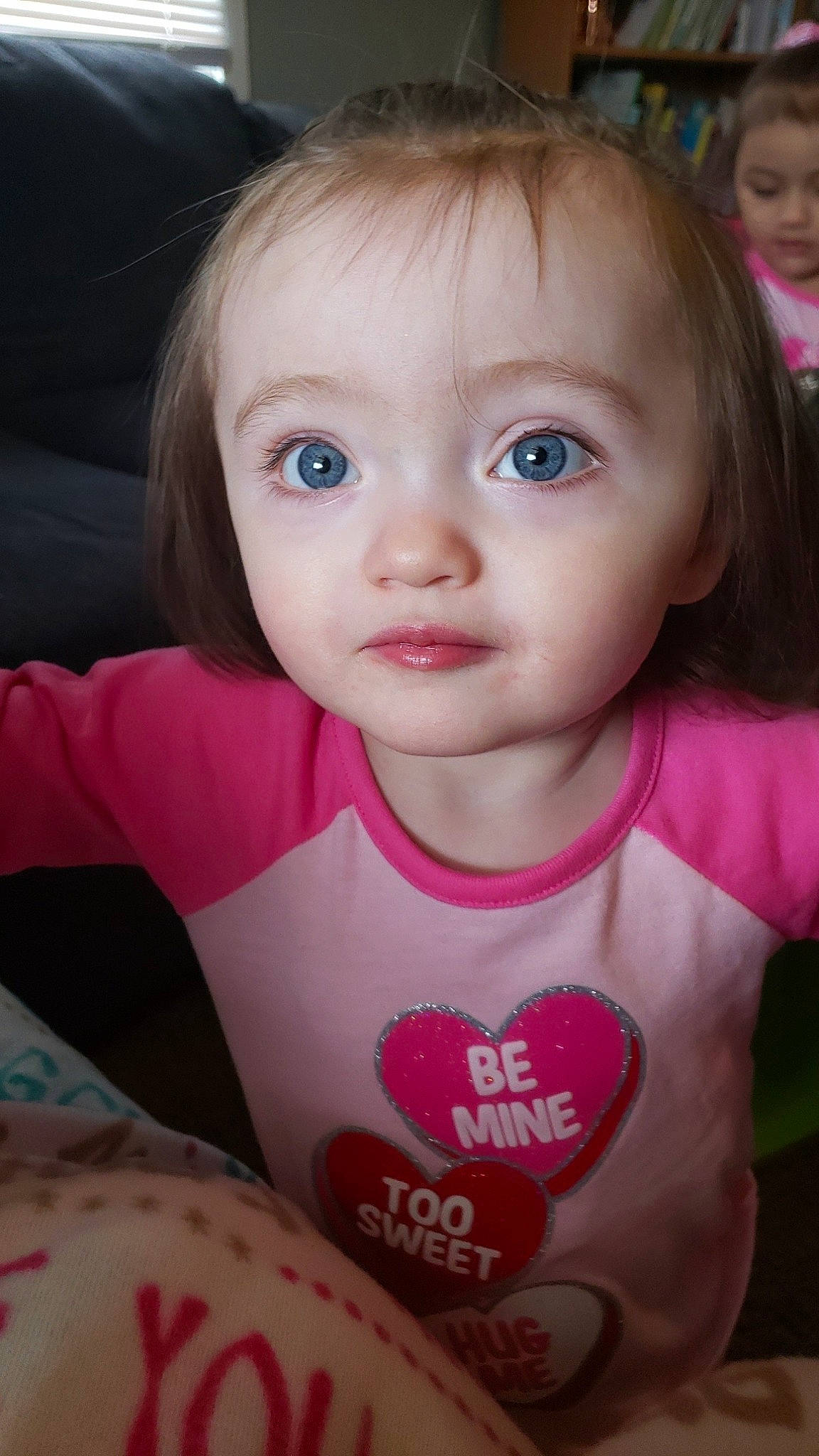 Nevaeh is registered to the contest to win money with this photo: arm, cheek, chin, dress, ear, eye, eyebrow, eyelash, face, forehead, hair, hand, head, human_body, lip, mouth, nose, organ, person, skin