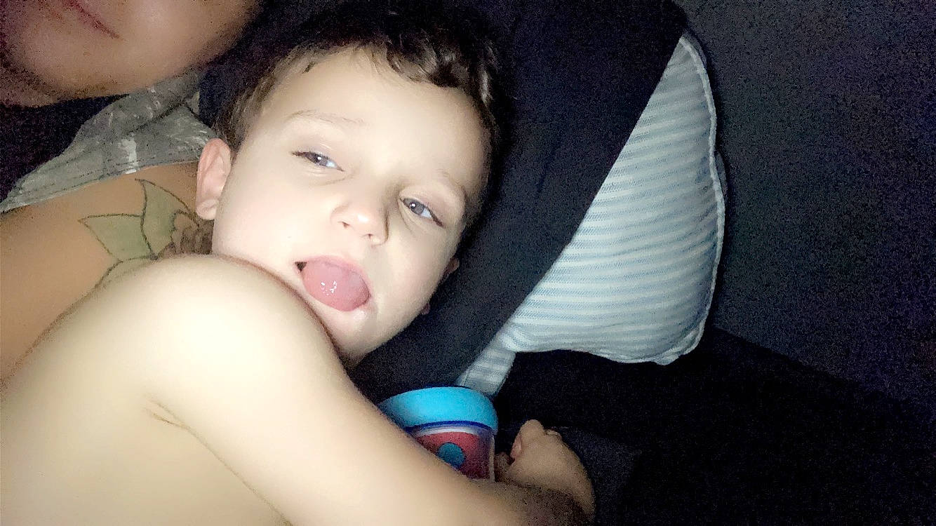 Hayden is registered to the contest to win money with this photo: baby, baby_products, cheek, chest, comfort, ear, elbow, eyelash, finger, gesture, happy, human_leg, jaw, lip, mouth, nail, nose, person, sitting, skin