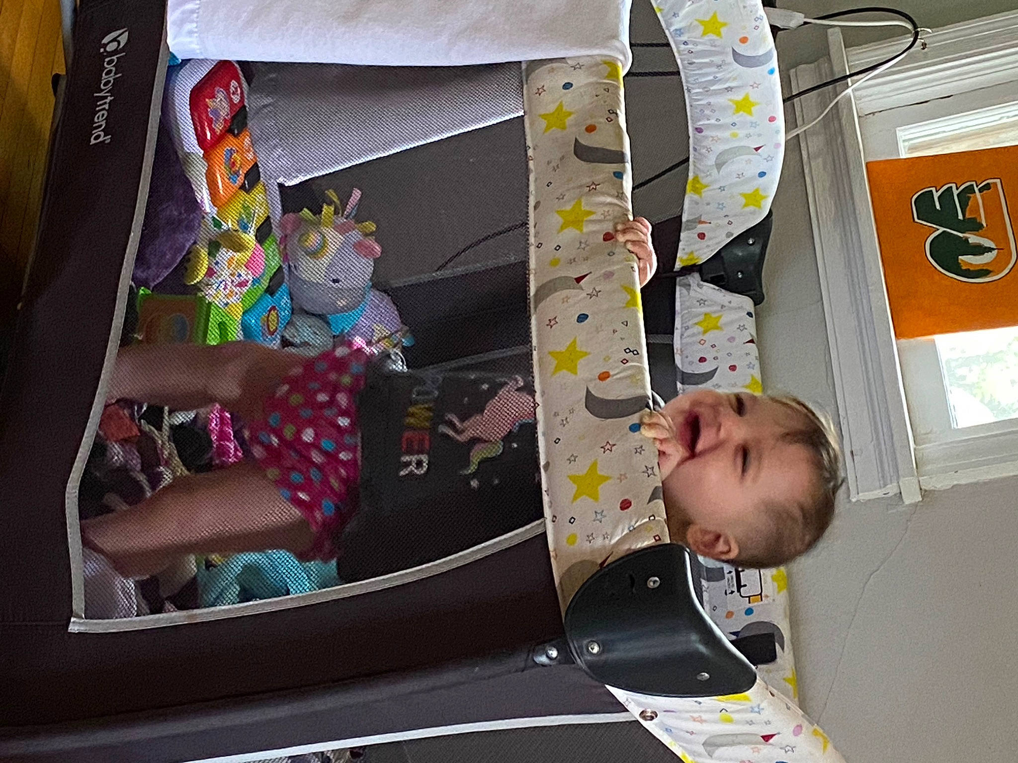 Alivia is registered to the contest to win money with this photo: baby, baby_products, baby_toys, car_seat, child, comfort, fun, leisure, person, play, room, sitting, t_shirt, toddler, trunk, vehicle_door