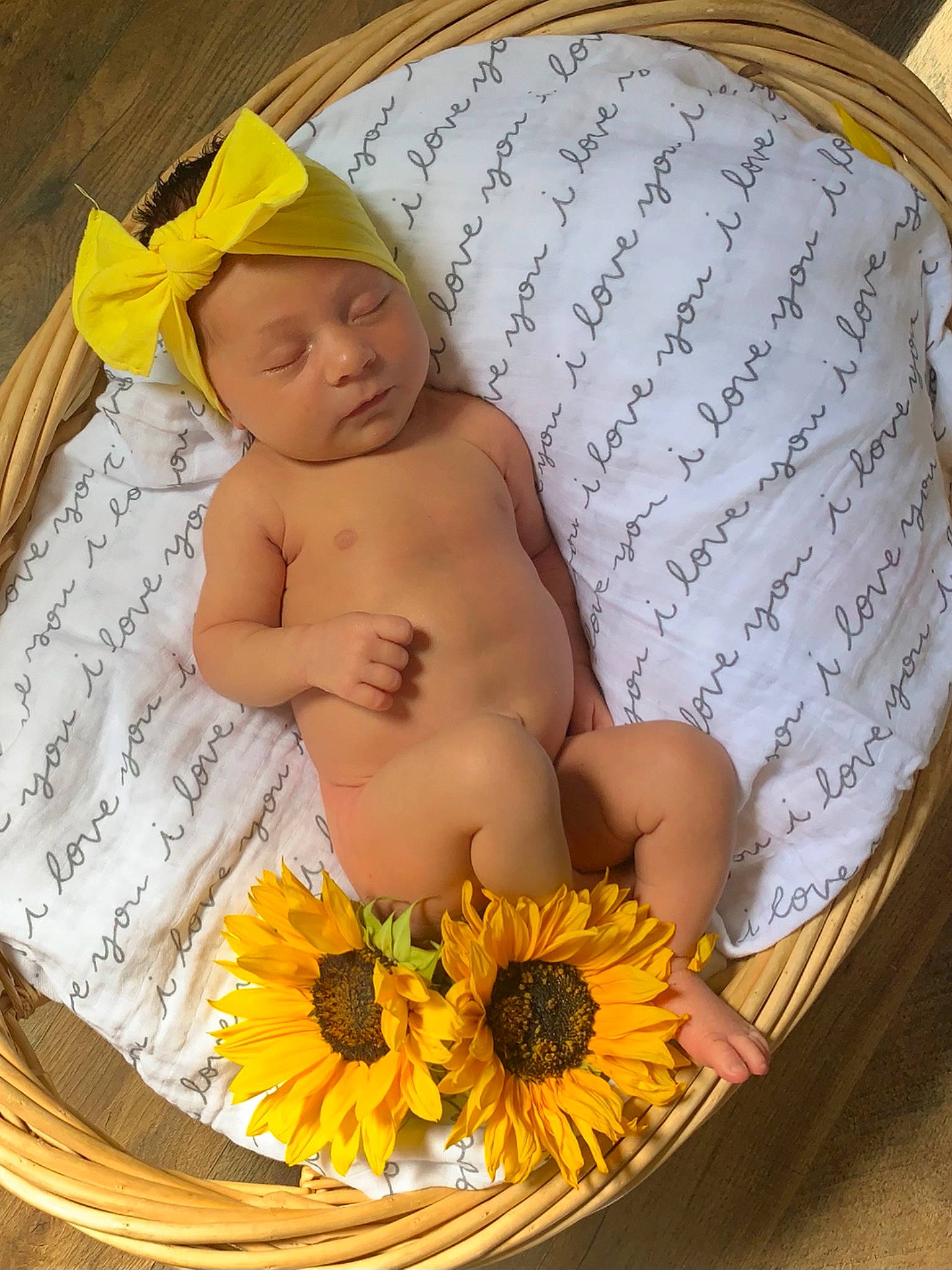 Charlotte is registered to the contest to win money with this photo: abdomen, baby, baby_sleeping, bedding, chair, chest, child, comfort, fashion_accessory, finger, flower, hand, happy, headpiece, headwear, linens, organ, person, petal, textile