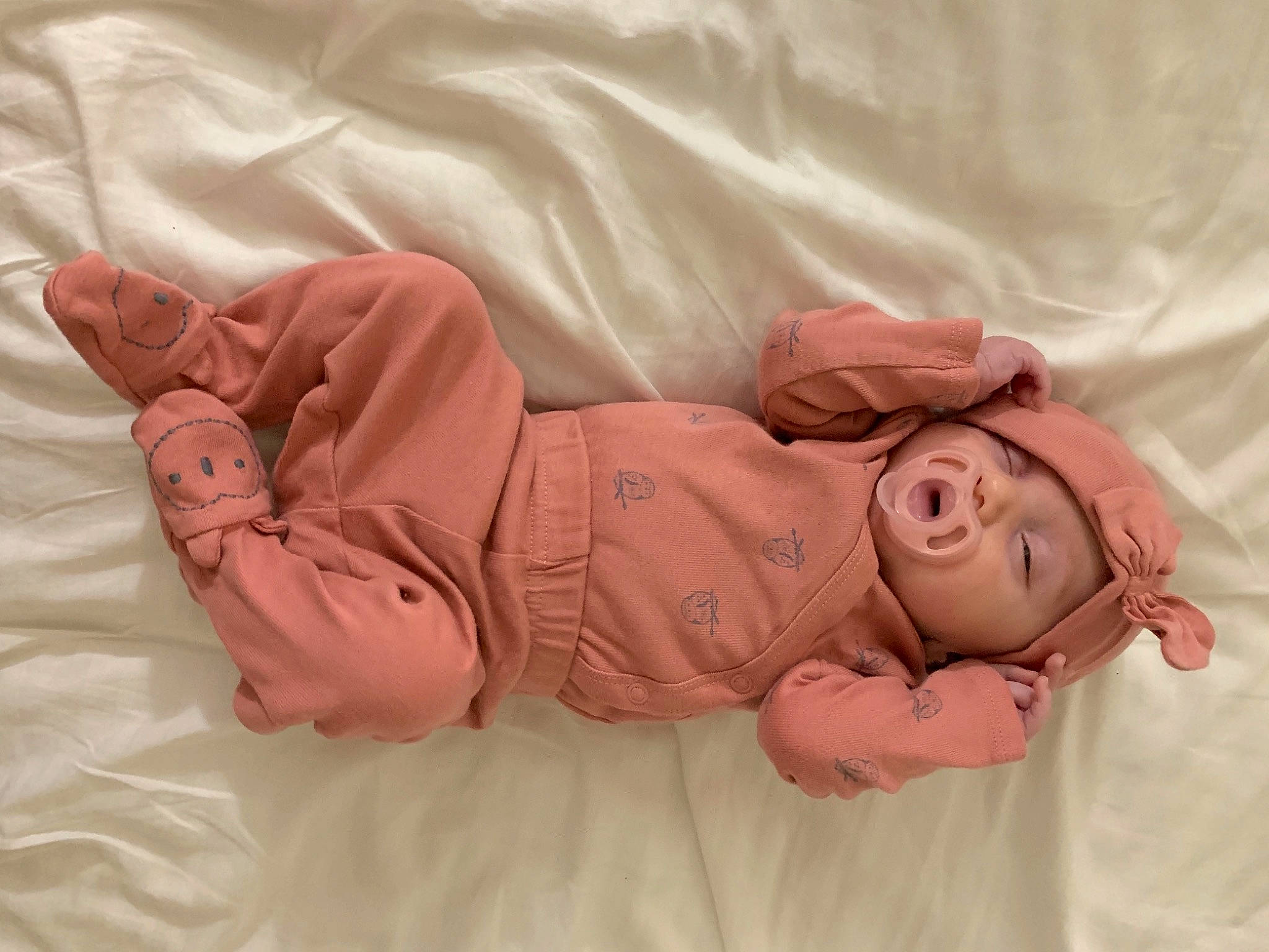 Kambrie joined the competition — help win amazing prizes! arm, baby, baby_products, baby_sleeping, baby_toddler_clothing, bedding, bedtime, child, comfort, flesh, flooring, foot, head, headwear, human_body, leg, linens, person, pink, room
