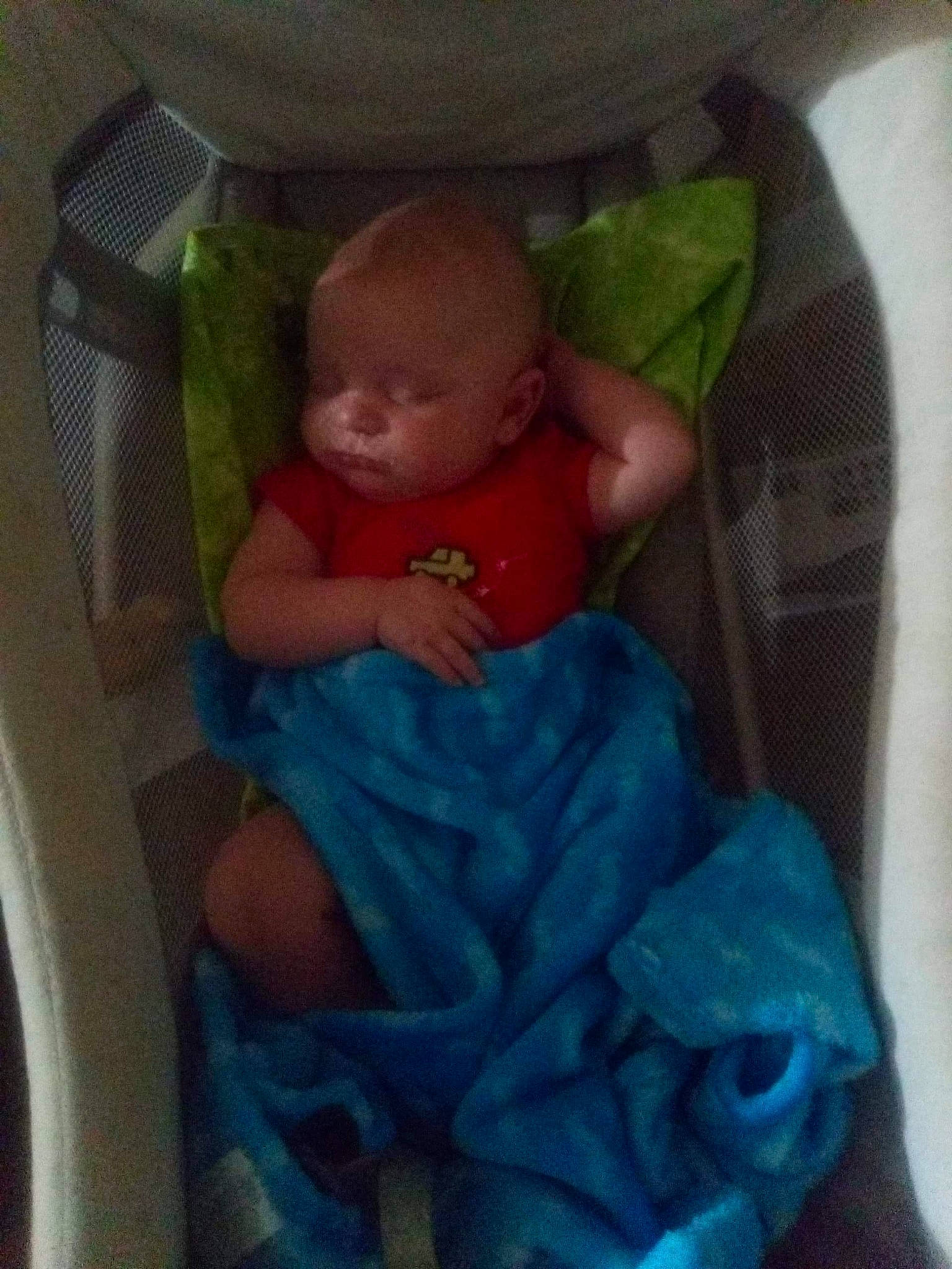 Kenneth is registered to the contest to win money with this photo: arm, baby, baby_carriage, baby_products, baby_toddler_clothing, chair, cheek, child, comfort, electric_blue, human_body, infant_bed, lap, leg, mouth, nail, person, room, sitting, thumb