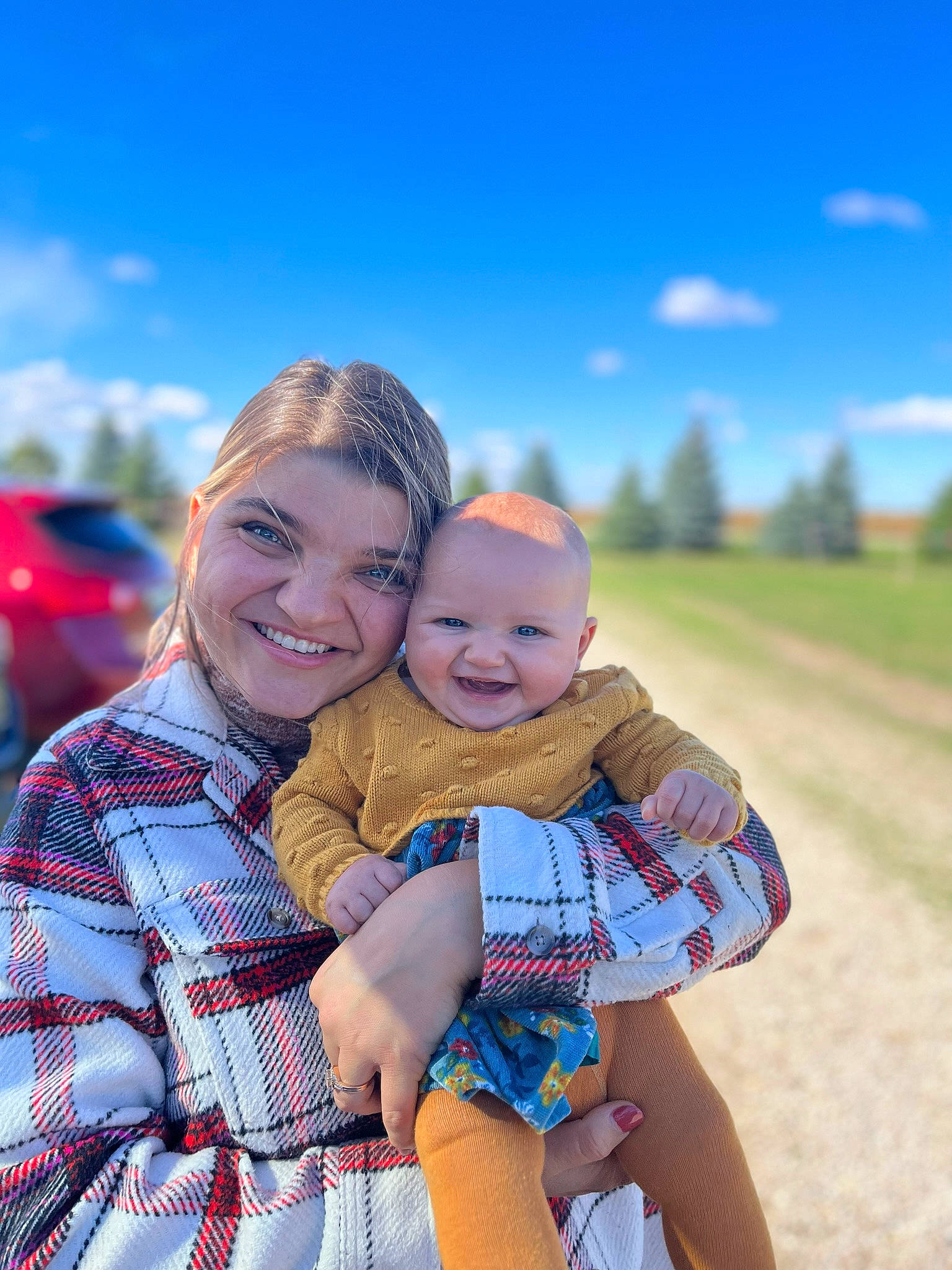 Evie joined the competition — help win amazing prizes! azure, baby, cloud, electric_blue, fun, grass, grass_family, happy, interaction, iris, joy, leisure, people_in_nature, person, plaid, skin, sky, smile, sunlight, tartan
