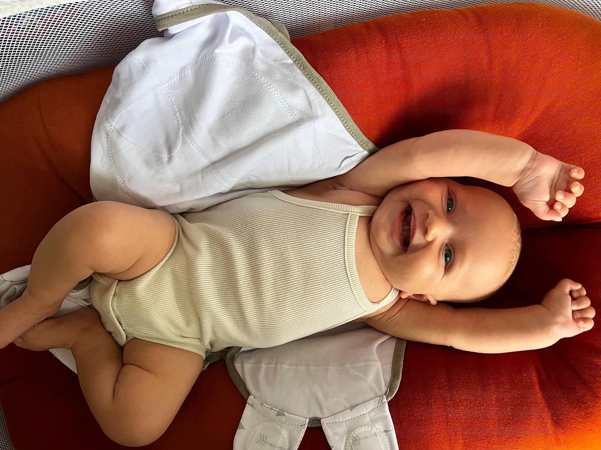 Evie is registered to the contest to win money with this photo: baby, baby_toddler_clothing, cheek, comfort, elbow, eye, face, gesture, human_body, human_leg, joint, joy, knee, mouth, nose, person, skin, sleeve, smile, thigh