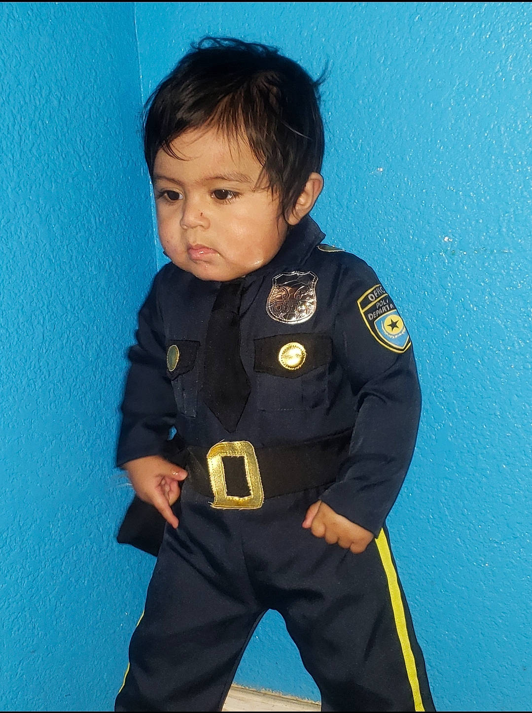 Donovan is registered to the contest to win money with this photo: child, person, uniform