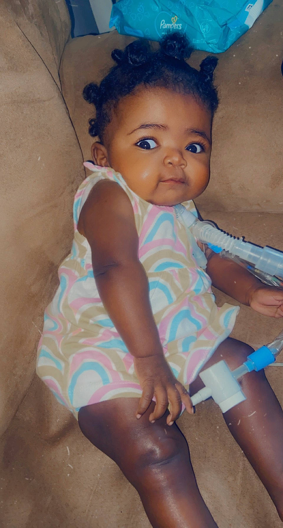 Aniyah is registered to the contest to win money with this photo: arm, baby_toddler_clothing, face, finger, hair, hand, head, human_body, iris, joint, leg, lip, mouth, organ, person, pink, shoulder, skin, standing, thigh