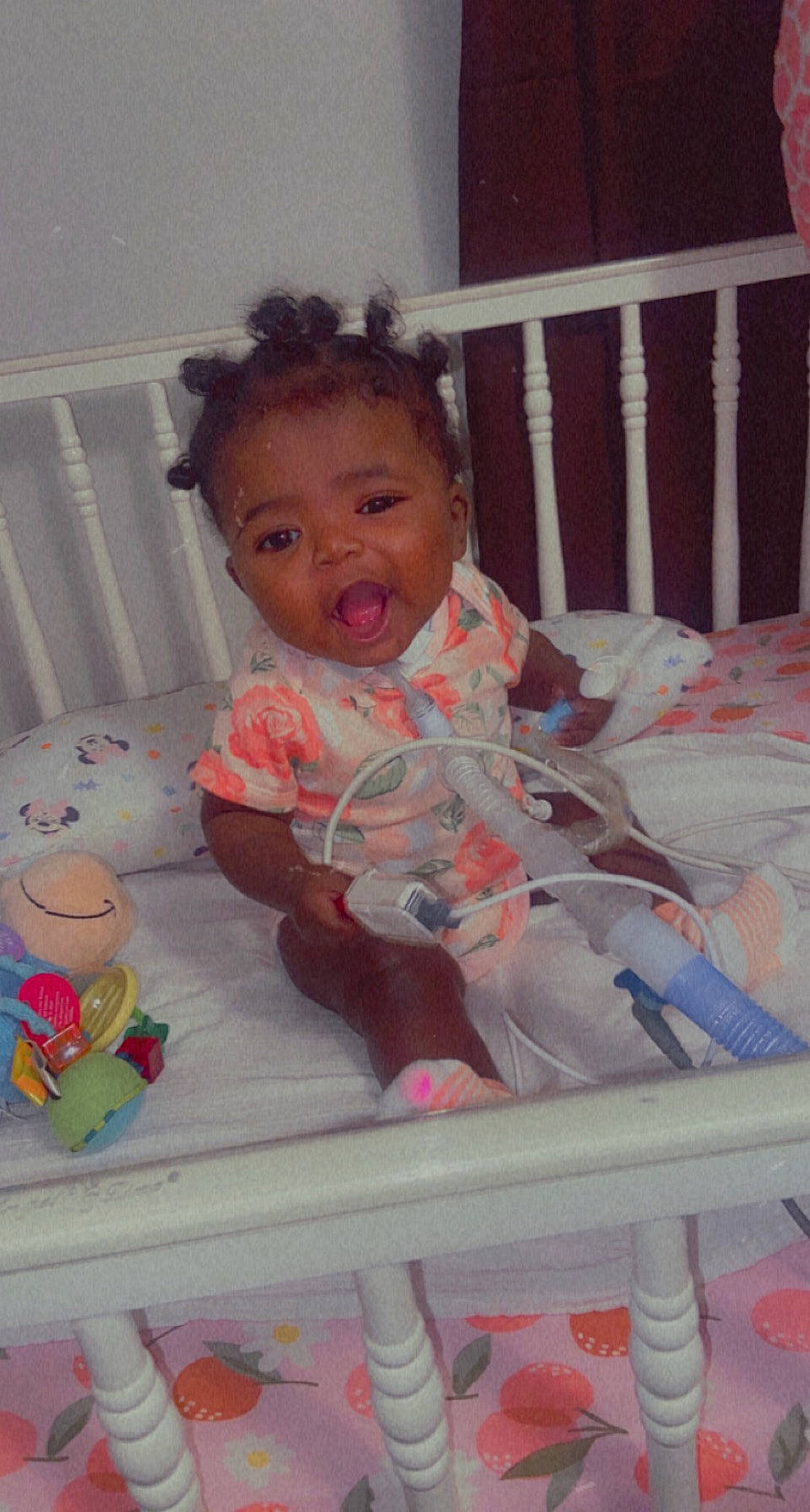 Aniyah is registered to the contest to win money with this photo: baby, baby_products, baby_safety, baby_toddler_clothing, cheek, child, comfort, cradle, eye, fun, happy, human_body, infant_bed, iris, linens, nursery, person, pink, room, skin