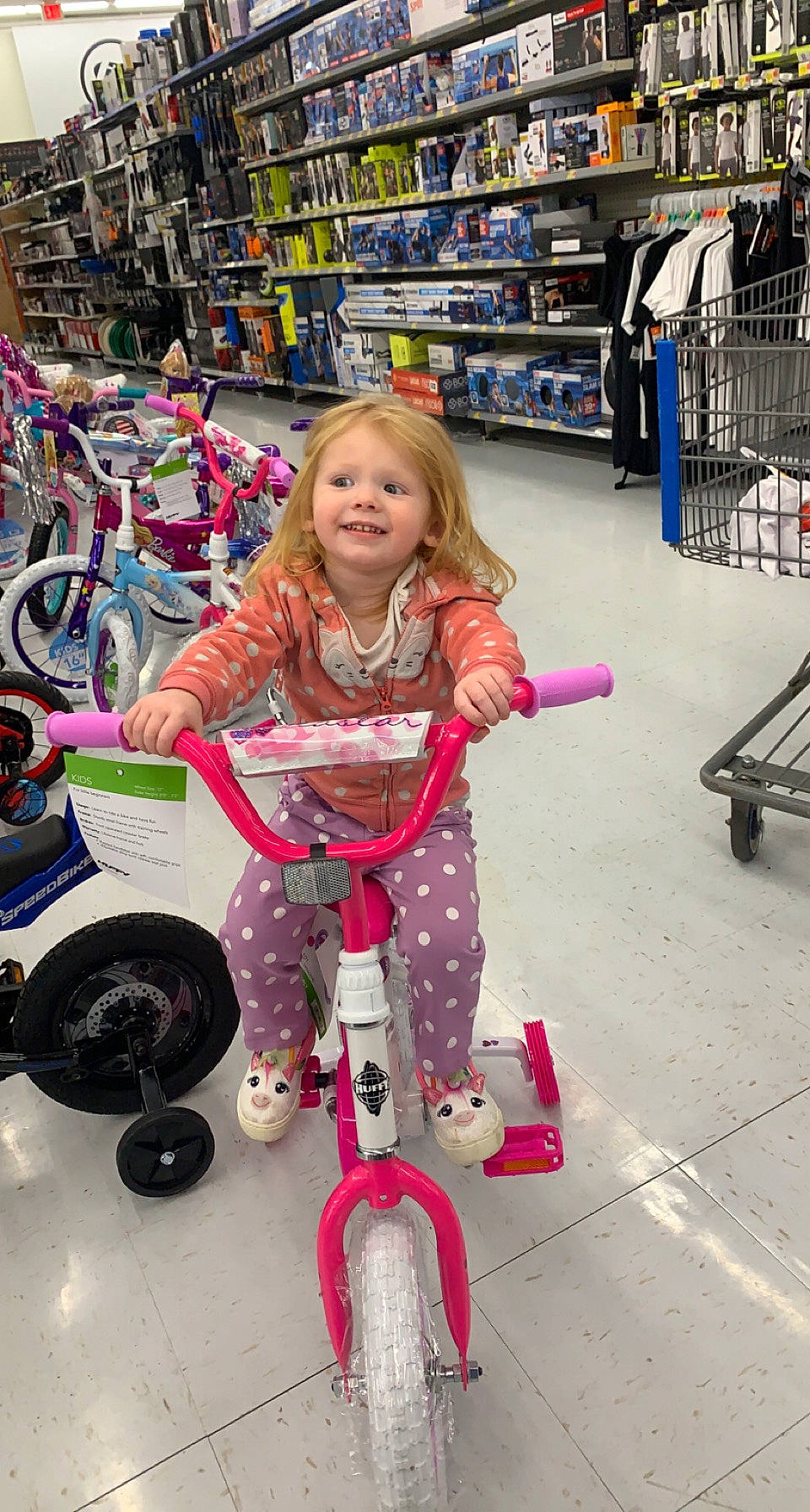 Novaleigh joined the competition — help win amazing prizes! automotive_tire, bicycle, bicycle_part, bicycle_tire, bicycle_wheel, child, city, fun, happy, joy, leisure, person, photograph, product, purple, riding_toy, shelf, smile, snapshot, tire