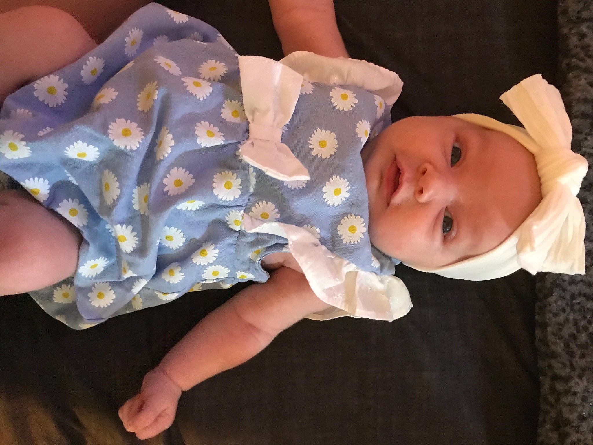 Emma is registered to the contest to win money with this photo: arm, baby, child, ear, finger, hand, headwear, person, product, skin, sleep, toddler