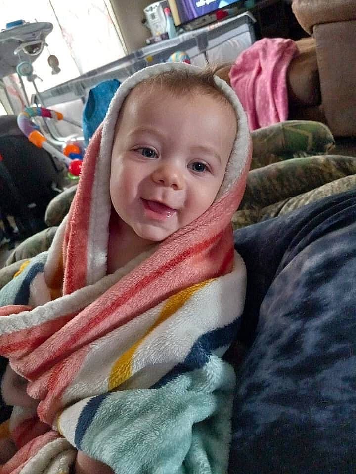 Matthew is registered to the contest to win money with this photo: baby, baby_carriage, baby_products, baby_safety, car_seat, cheek, child, comfort, couch, fashion_accessory, happy, linens, person, pillow, room, scarf, selfie, skin, smile, television