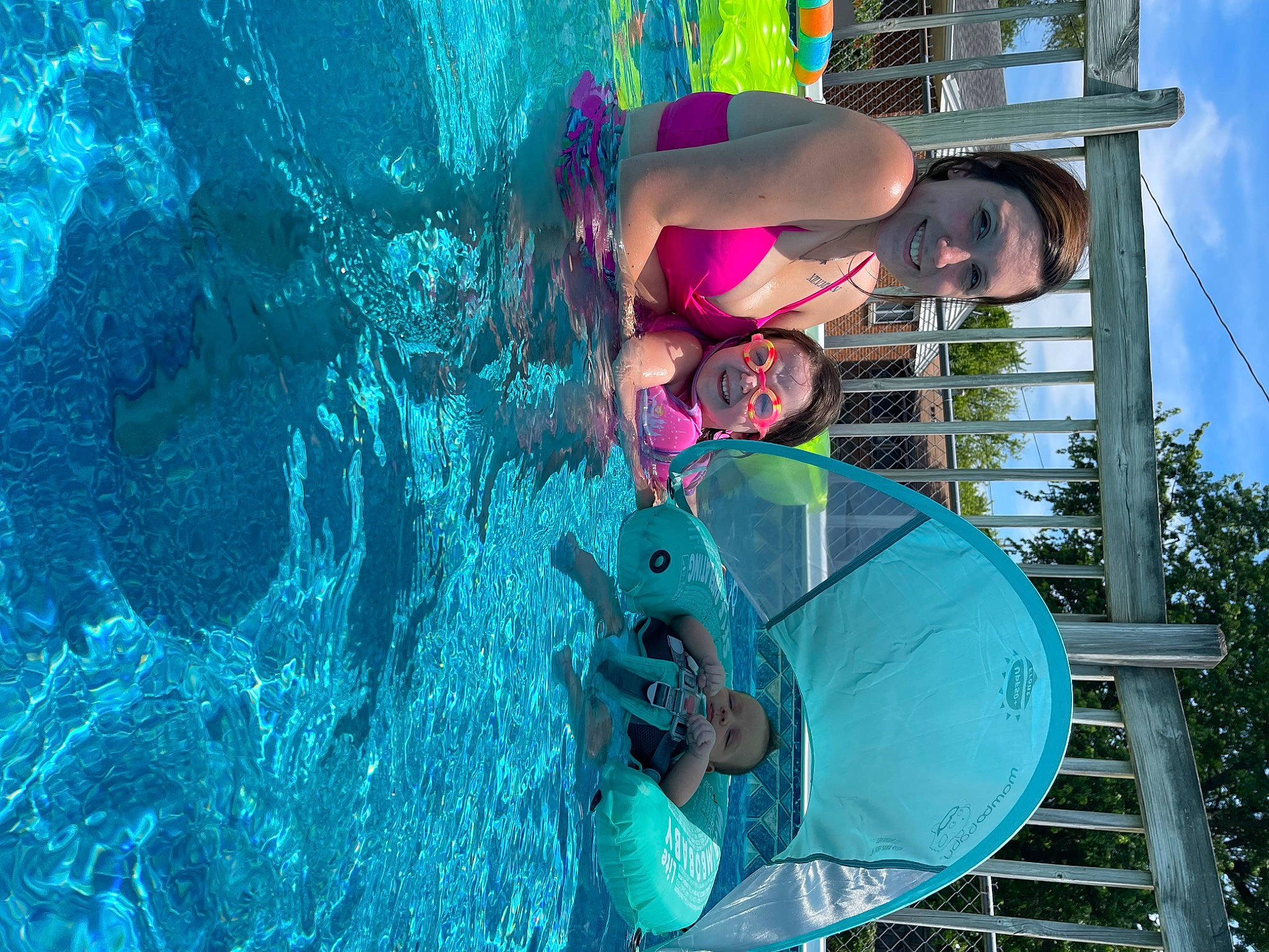 Baker joined the competition — help win amazing prizes! beauty, blue, electric_blue, eyewear, fun, happy, hat, joy, leisure, magenta, person, personal_protective_equipment, recreation, sky, smile, snapshot, swimming_pool, swimwear, tree, vacation