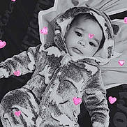 Kingston joined the competition — help win amazing prizes! baby, infant, onesie, fuzzy_clothing, hood, lying_down, pink_hearts, monochrome, cute, calm, face, child, soft_texture, cozy, portrait, baby_clothes, adorable, small_child, warm, sleepwear