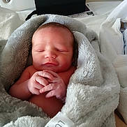 Jackson joined the competition — help win amazing prizes! newborn, baby, infant, blanket, swaddle, sleeping, hospital_bed, bed, hands, face, closed_eyes, soft_texture, plush_blanket, tag, peaceful, cozy, wrapped, portrait, skin, newborn_hospital