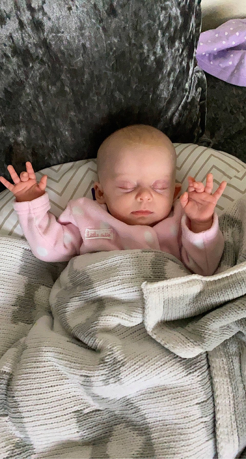 Amelia-grace is registered to the contest to win money with this photo: arm, baby, baby_products, baby_sleeping, baby_toddler_clothing, bedding, cheek, child, chin, comfort, eye, eyelash, gesture, hand, linens, person, sitting, skin, textile, thumb