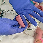 Divine joined the competition — help win amazing prizes! newborn, baby, hospital, gloves, foot, medical, pacifier, infant, hands, bed, diaper, wire, healthcare, patient, pediatric, care, closeup, skin, tiny, fragile