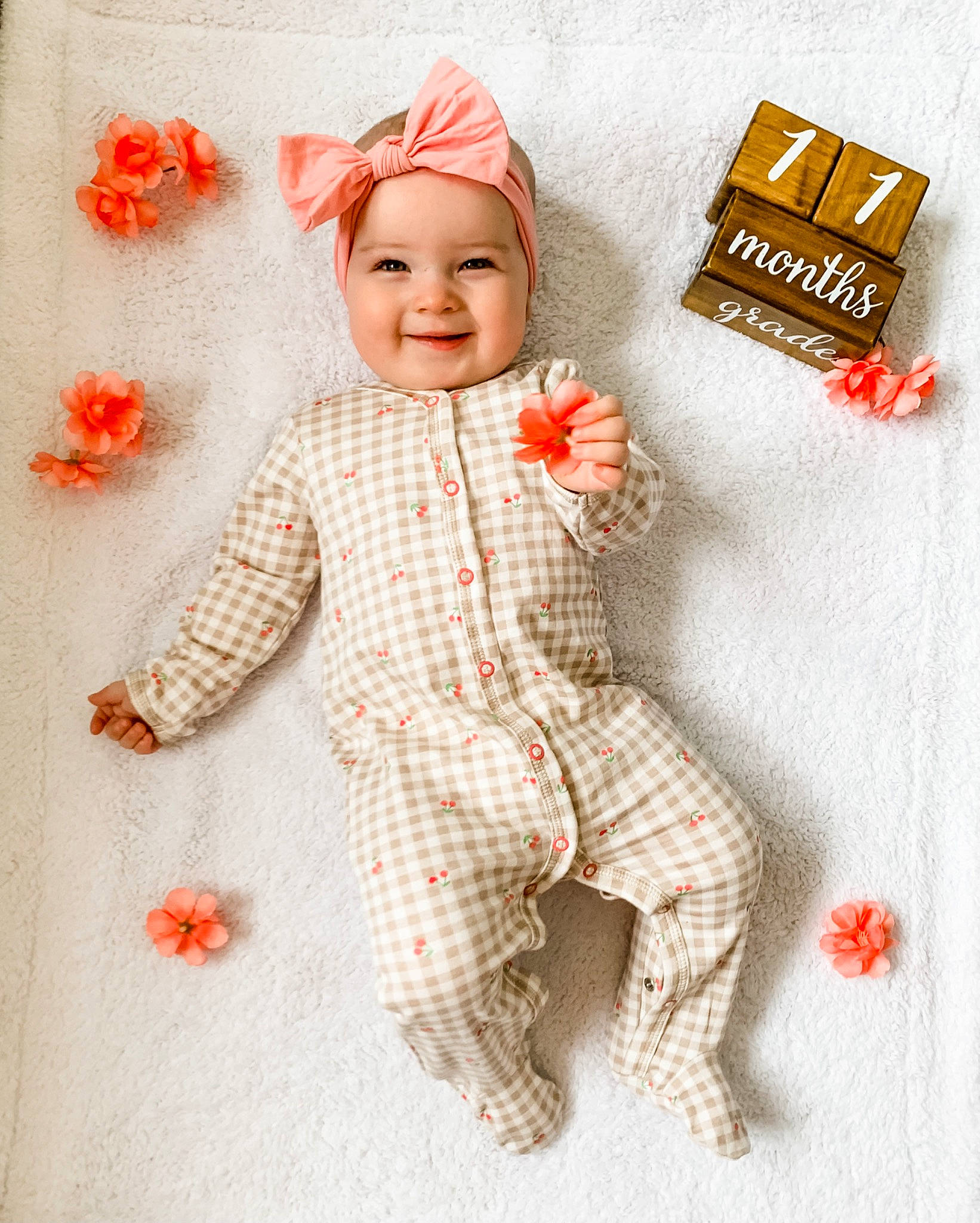 Charlotte is registered to the contest to win money with this photo: art, baby, baby_toddler_clothing, cap, carmine, child, costume_hat, doll, face, fashion_accessory, font, happy, headgear, headwear, joy, pattern, peach, person, sleeve, smile