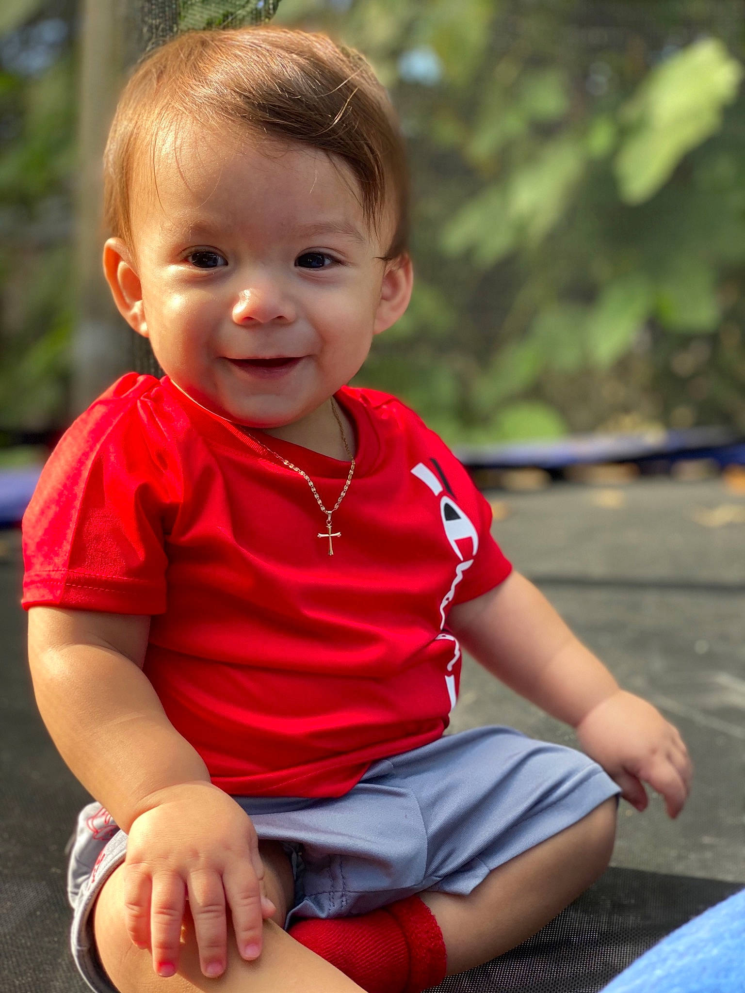 Tristian is registered to the contest to win money with this photo: baby, cheek, child, leisure, person, photography, play, red, sitting, skin, smile, summer, toddler