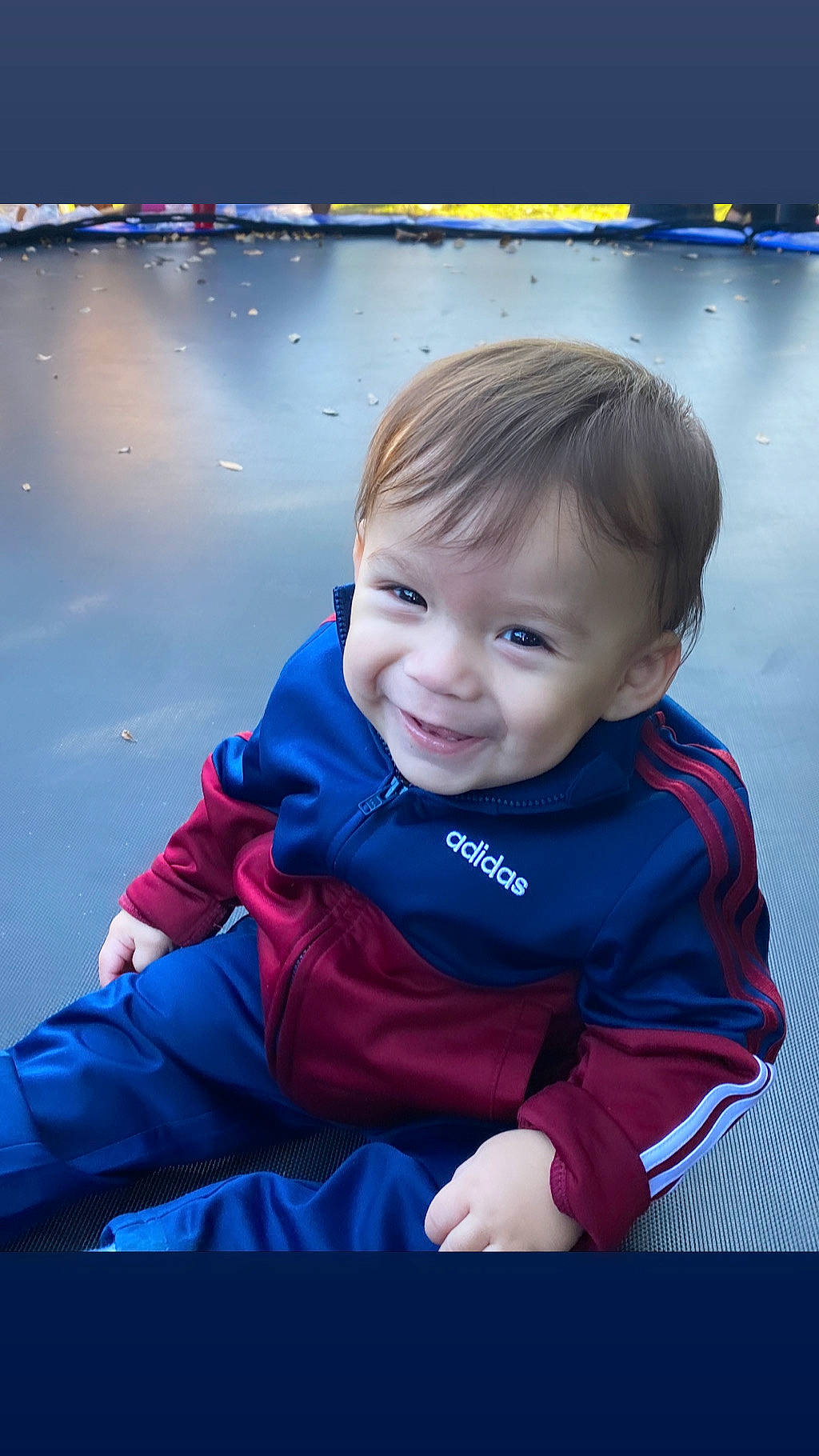 Tristian joined the competition — help win amazing prizes! baby, blue, cheek, child, electric_blue, eye, face, person, photography, portrait_photography, red, sitting, skin, sky, smile, toddler, vacation