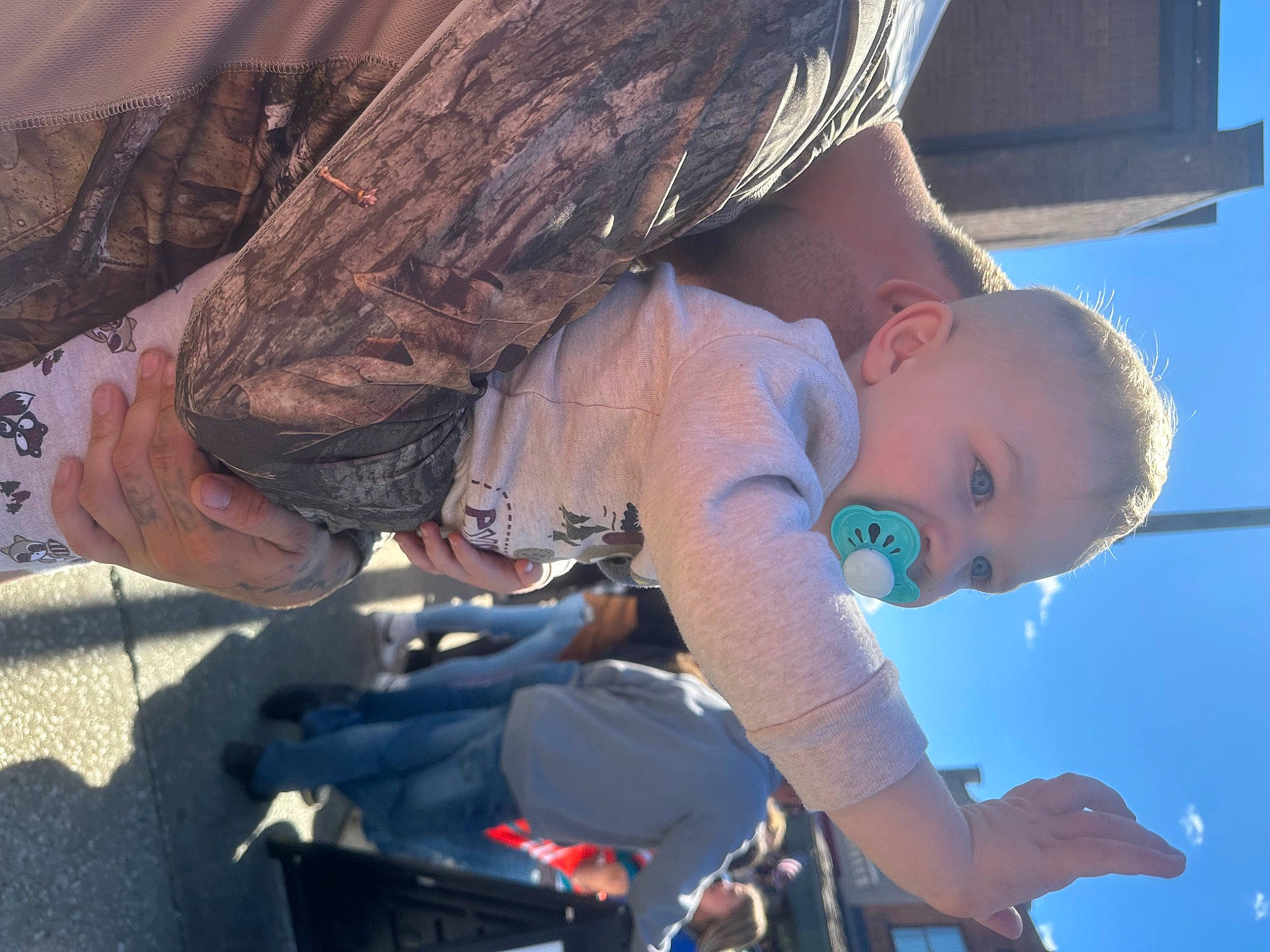 Daxton is registered to the contest to win money with this photo: baby, child, cloud, electric_blue, fashion_accessory, fun, happy, hat, landscape, leisure, person, personal_protective_equipment, recreation, sky, smile, soil, toddler, travel, vacation