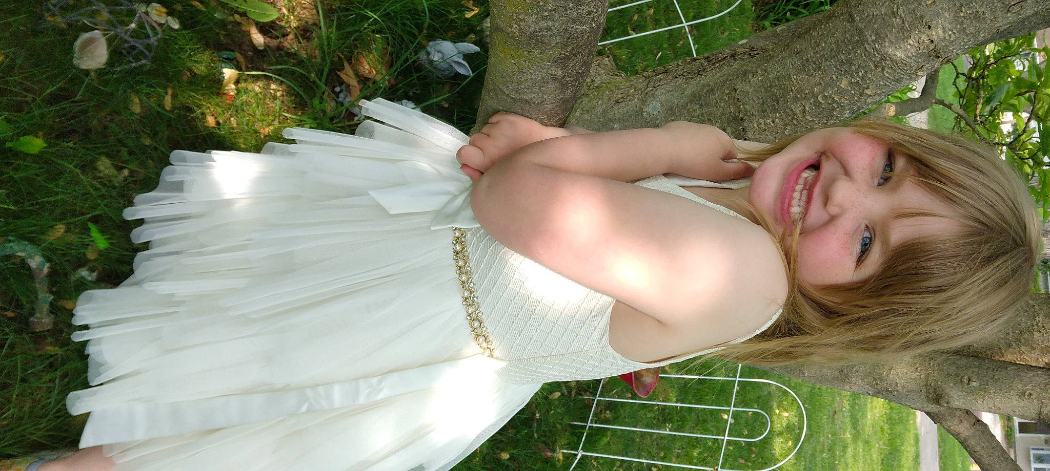 Lillian is registered to the contest to win money with this photo: abdomen, chest, dress, elbow, event, fun, grass, happy, human_leg, jewellery, joy, long_hair, people_in_nature, person, photograph, plant, smile, summer, thigh, trunk