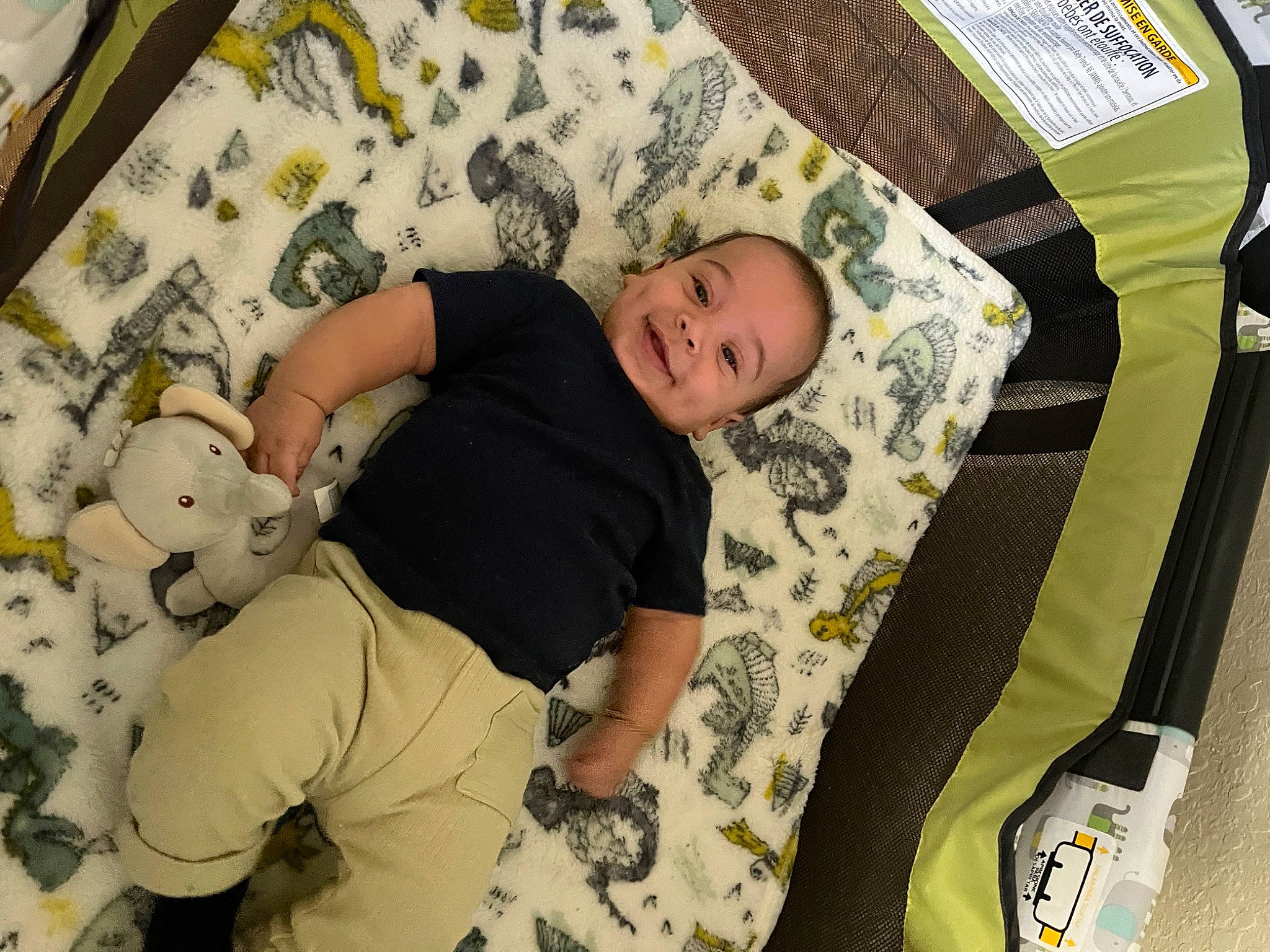 Liam joined the competition — help win amazing prizes! baby, baby_products, baby_toddler_clothing, bedtime, camouflage, child, comfort, fun, happy, joy, linens, military_camouflage, pattern, person, room, sitting, sleep, smile, t_shirt, thigh