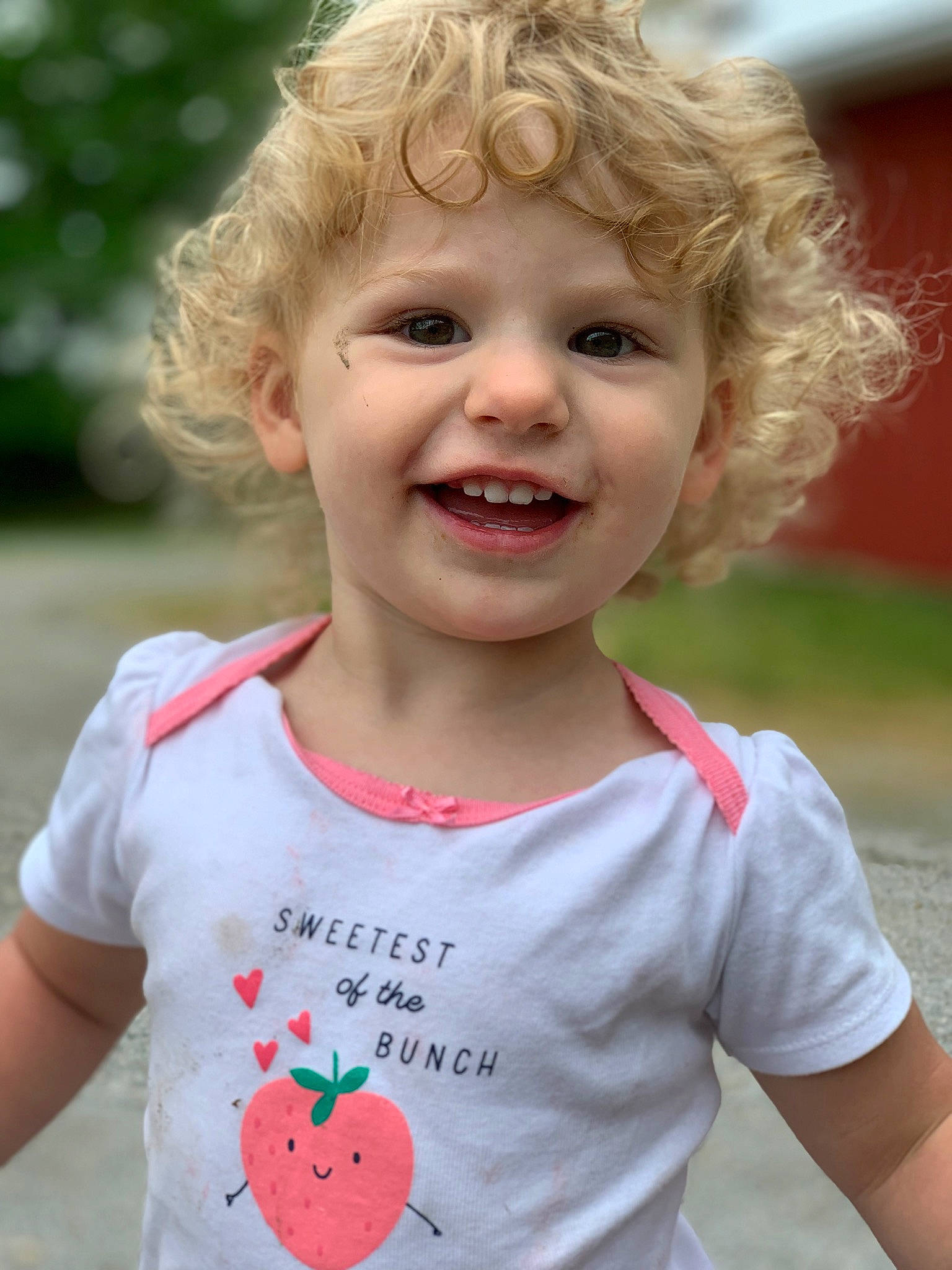 Cecilia joined the competition — help win amazing prizes! child, eye, facial_expression, grass, green, happy, joy, mammal, organ, people_in_nature, person, photograph, pink, plant, red, skin, sleeve, smile, summer, t_shirt