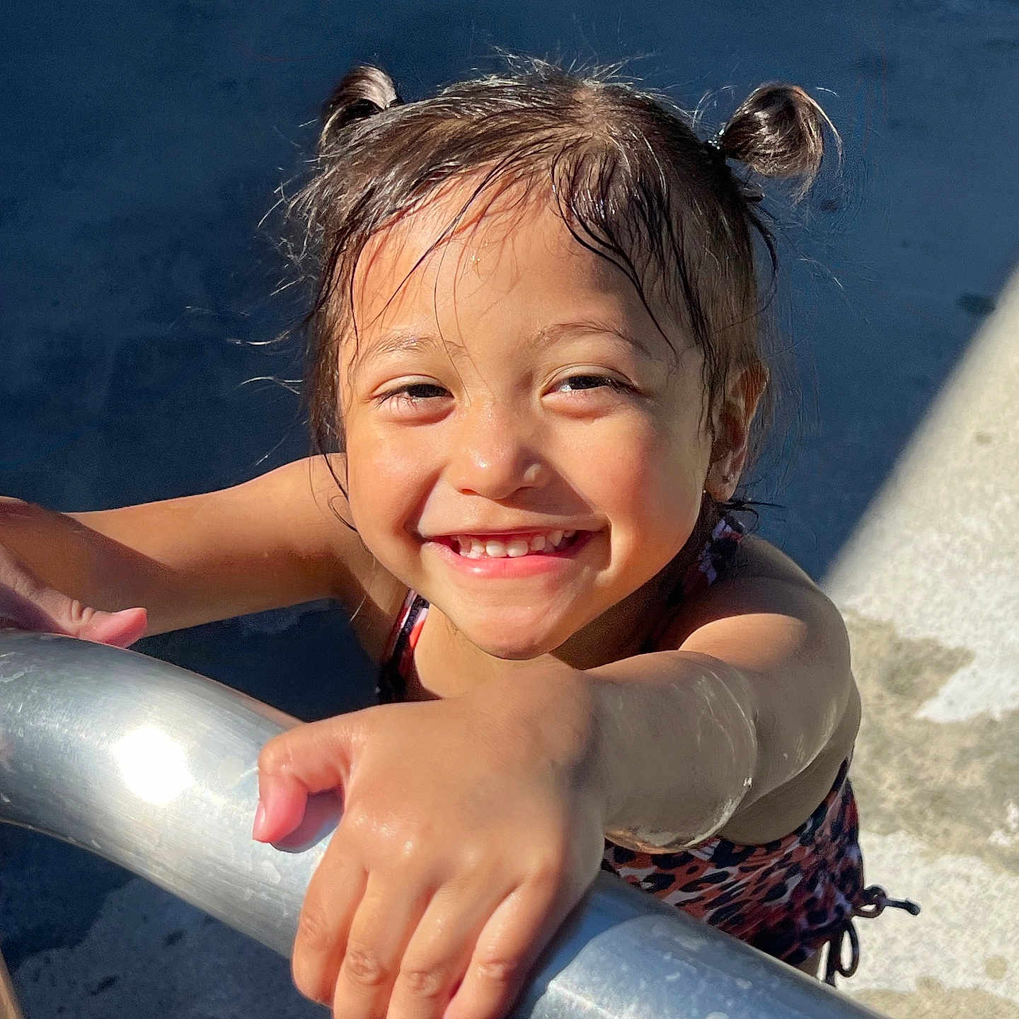Azaylah Anaveah is registered to the contest to win money with this photo: bodypart, child, clothing, dress, face, female, finger, girl, hand, handrail, happy, head, laughing, mouth, outdoors, person, photography, portrait, smile, teeth