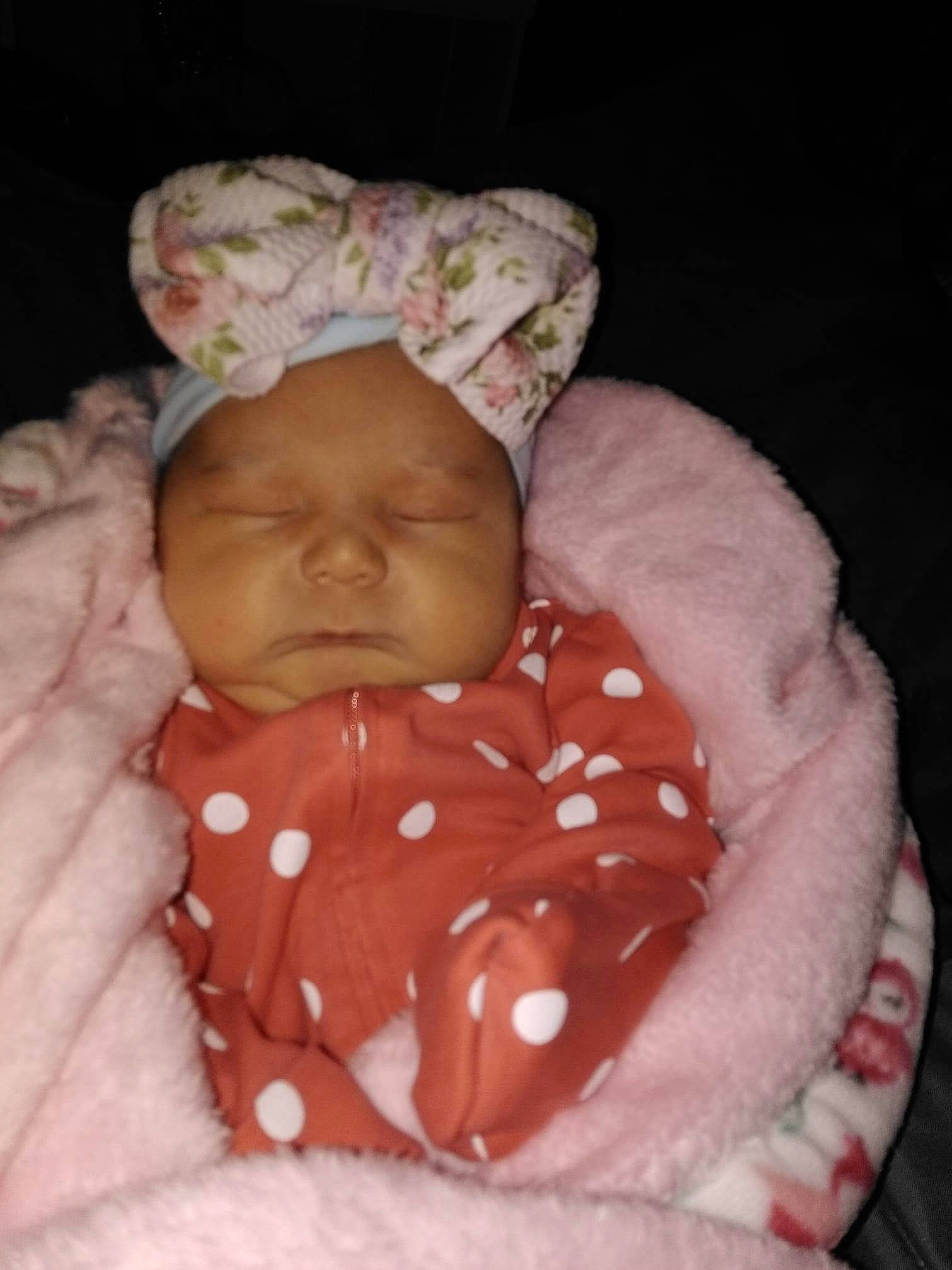 Stori is registered to the contest to win money with this photo: baby, baby_products, baby_sleeping, baby_toddler_clothing, bedtime, cheek, child, chin, comfort, face, head, headgear, headwear, linens, lip, nose, person, pink, skin, sleeve