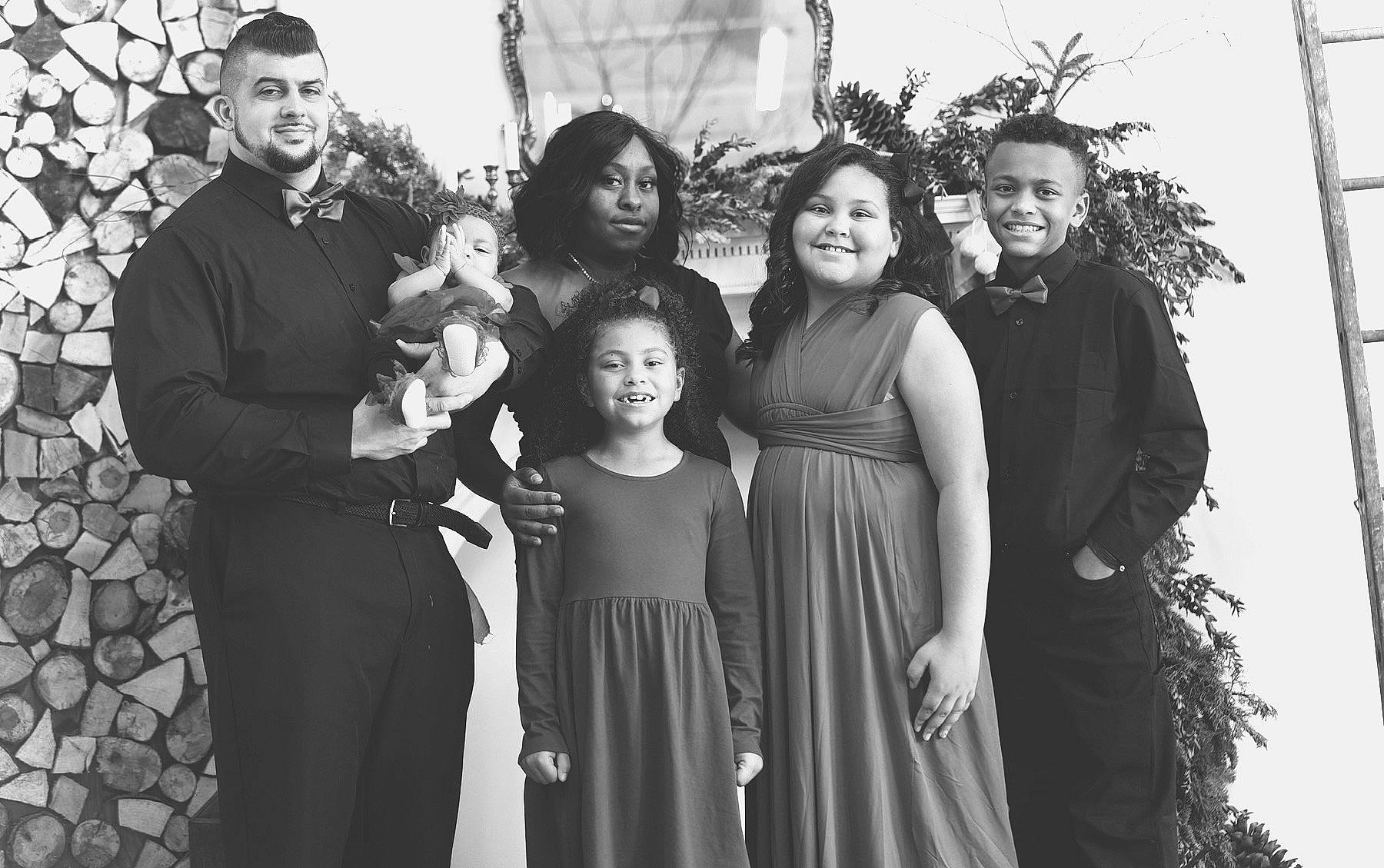 Gia is registered to the contest to win money with this photo: black_and_white, day_dress, event, facial_expression, family_taking_photos_together, fashion, formal_wear, friendship, fun, hairstyle, happy, human, joy, monochrome, monochrome_photography, one_piece_garment, person, smile, standing, style