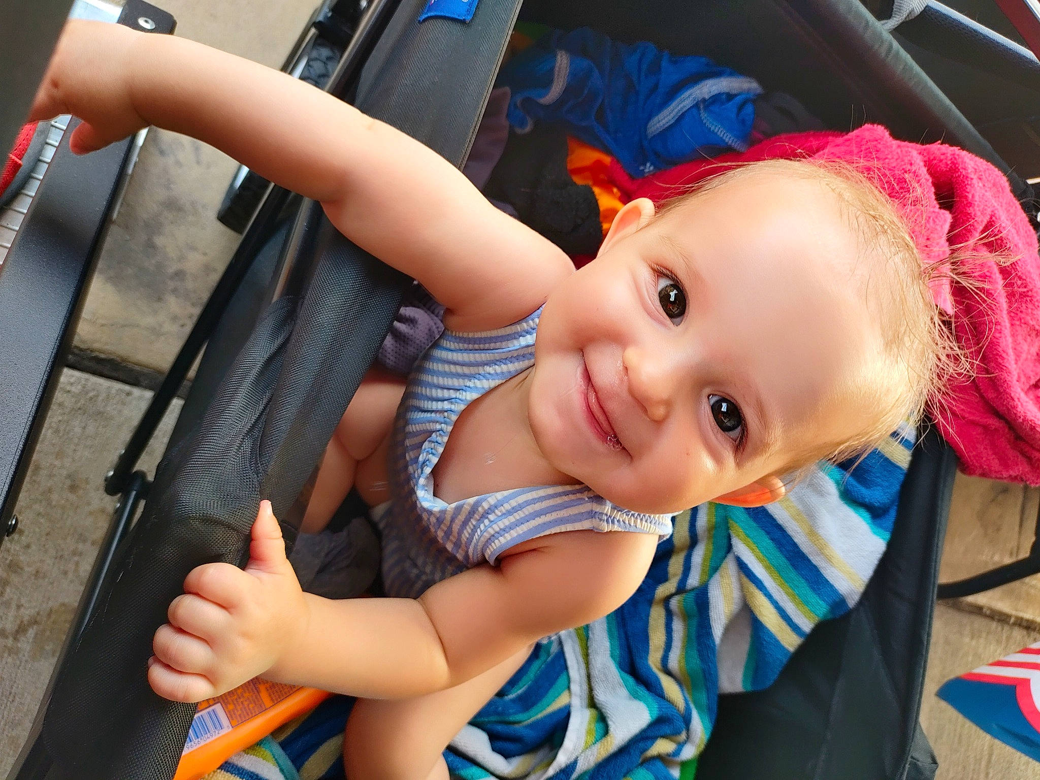 Calliope is registered to the contest to win money with this photo: baby, baby_carriage, baby_toddler_clothing, beauty, blue, chair, face, facial_expression, finger, fun, happy, joy, leisure, mouth, organ, person, plant, product, skin, smile