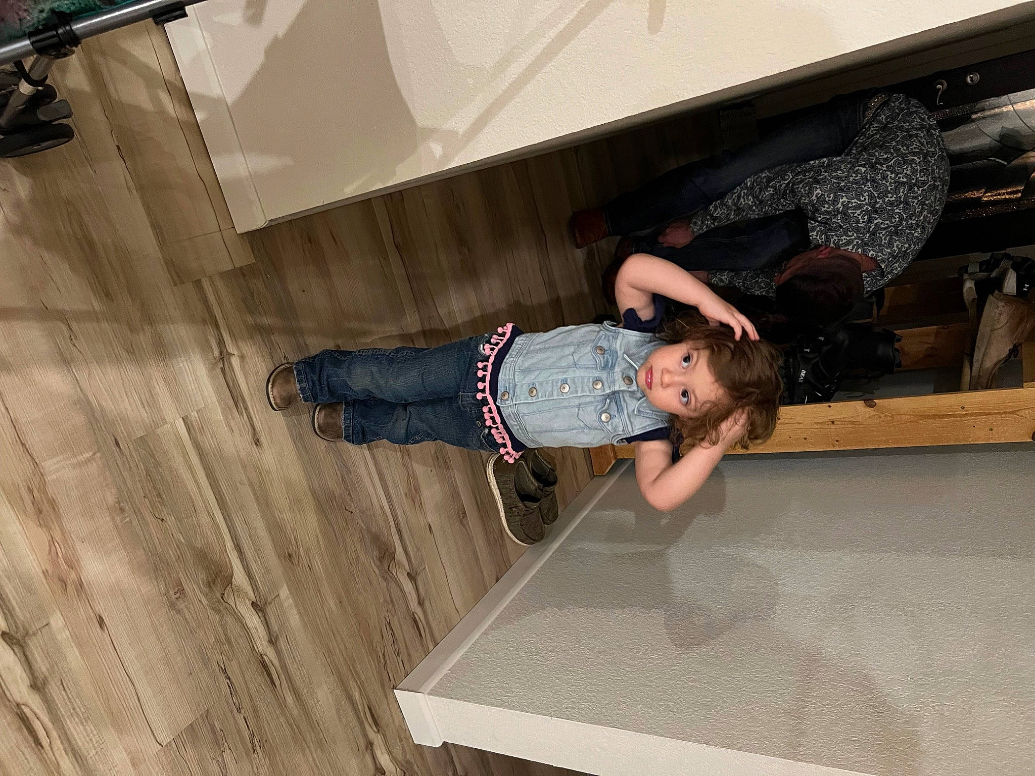 Claira is registered to the contest to win money with this photo: floor, flooring, foot, fun, hardwood, human_leg, knee, leg, person, room, sandal, smile, t_shirt, thigh, waist, wood, wood_flooring