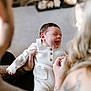 Albie joined the competition — help win amazing prizes! baby, infant, laughing, white_outfit, tattoos, hands, family, indoor, cozy, cute, portrait, person, smiling, happy, newborn, child, skin, people, holding, love