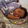Genesis joined the competition — help win amazing prizes! baby, sleeping, blanket, knitted, purple, white, cushion, animal_pattern, soft, cozy, child, peaceful, curly_hair, resting, indoors, cute, infant, portrait, hand, toddler