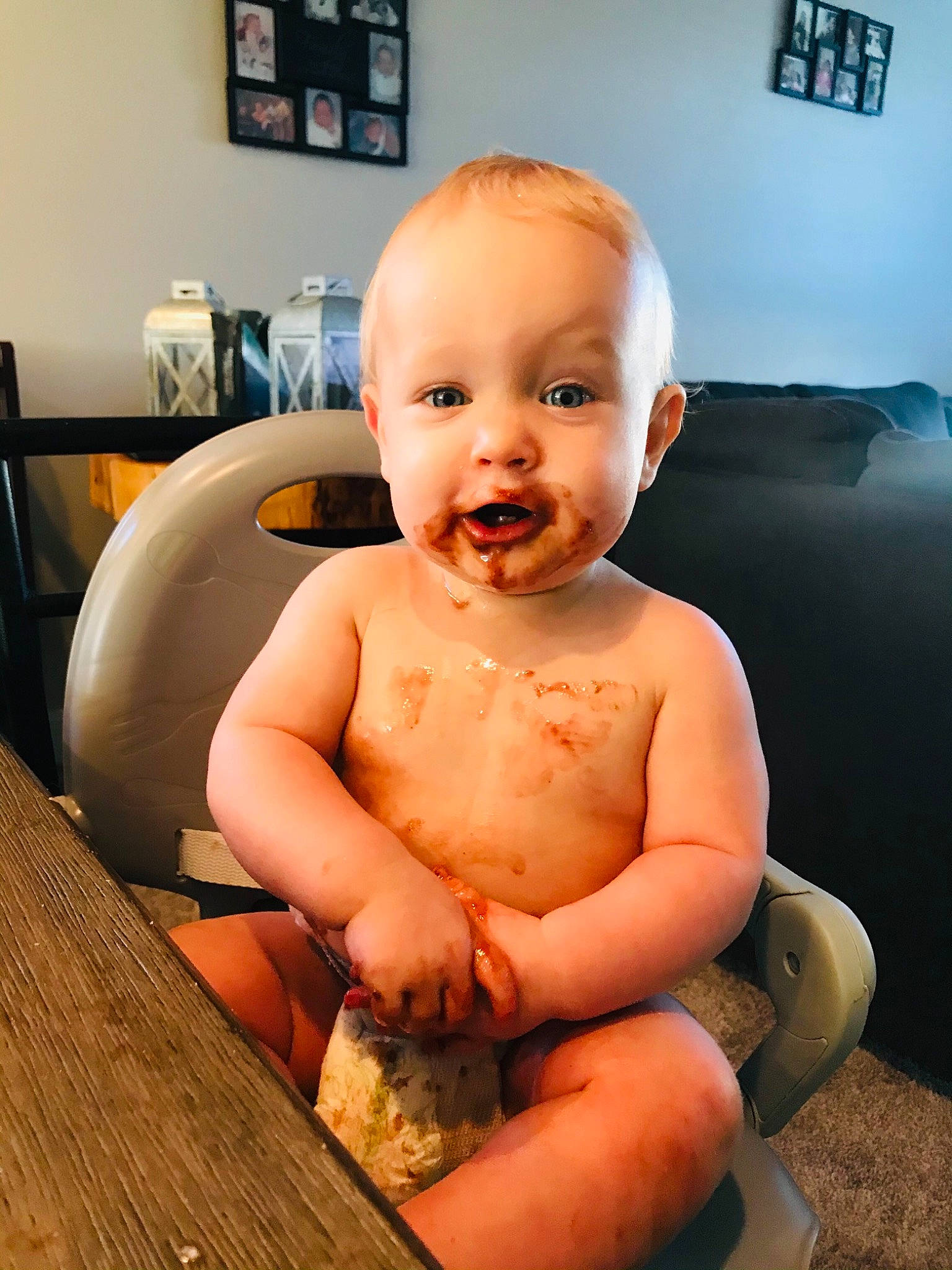 Braxtyn is registered to the contest to win money with this photo: abdomen, baby, baby_toddler_clothing, cheek, chest, child, couch, display_device, home_accessories, lamp, living_room, person, picture_frame, pillow, sitting, skin, stomach, throat, toddler, toe