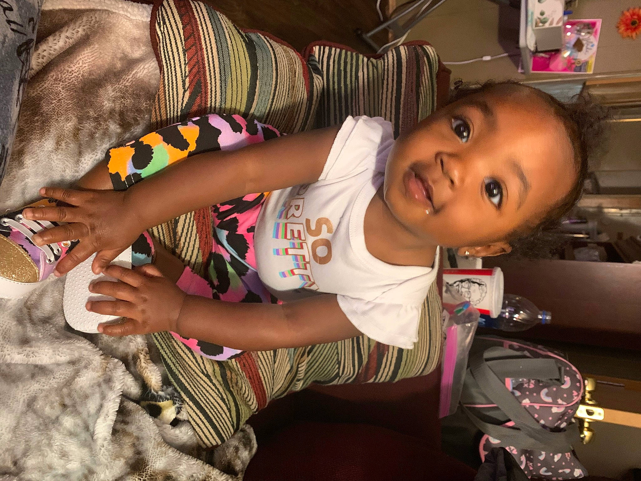 Izzabella joined the competition — help win amazing prizes! child, cool, elbow, finger, fun, hand, happy, human_body, human_leg, leg, pattern, person, sitting, skin, smile, t_shirt, thigh, thumb, toddler, trunk