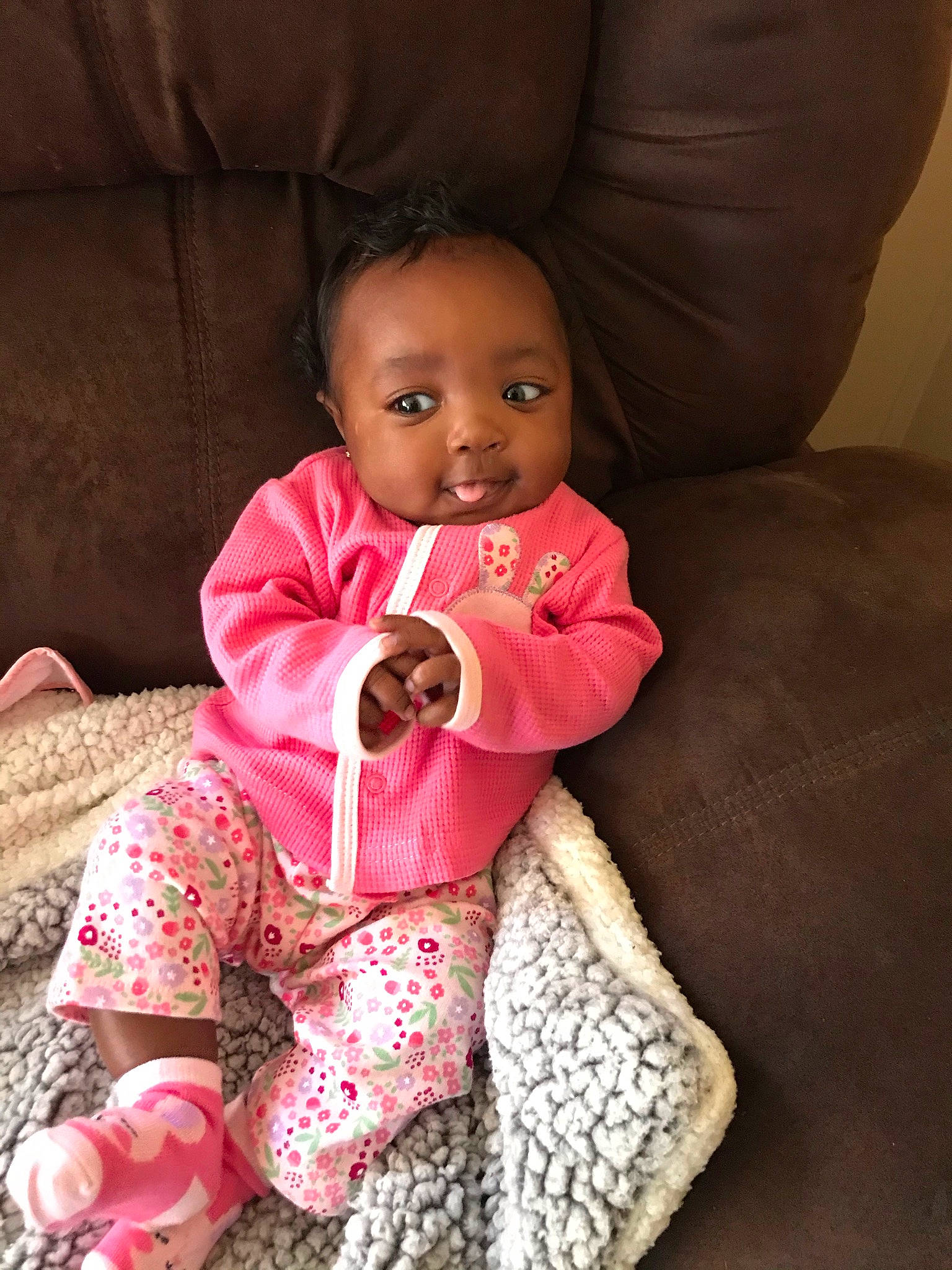 Izzabella joined the competition — help win amazing prizes! baby, baby_toddler_clothing, cheek, comfort, couch, dress, face, floor, flooring, happy, head, iris, linens, lip, magenta, person, pink, skin, sleeve, smile