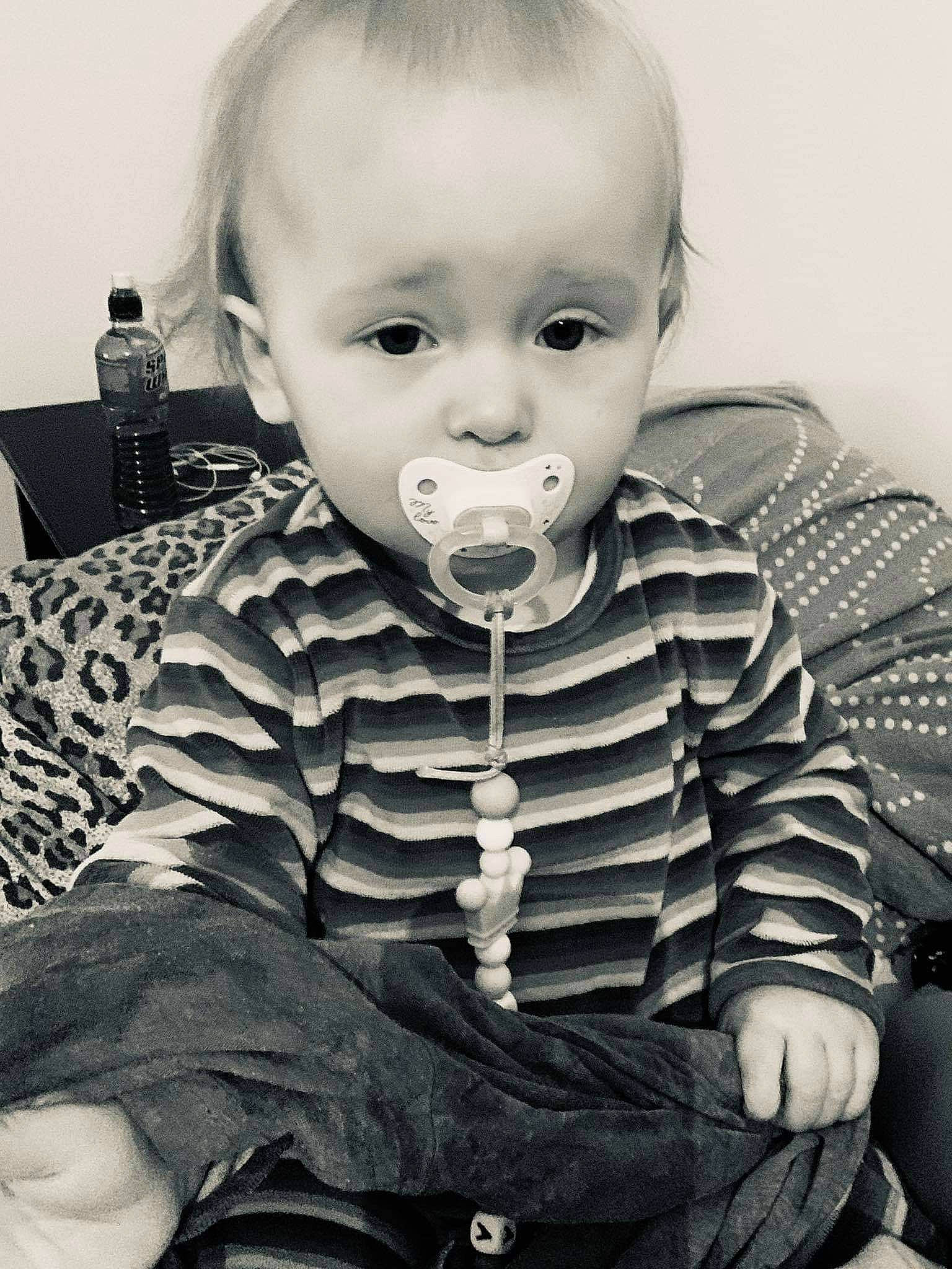 Syliana participe au concours pour gagner de l'argent avec cette photo : baby_toddler_clothing, black_and_white, cheek, comfort, cool, eyebrow, eyelash, facial_expression, flash_photography, happy, head, human, iris, nose, person, skin, sleeve, standing, style, toddler