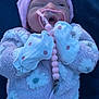 Delilah joined the competition — help win amazing prizes! baby, blanket, bodypart, bonnet, cap, clothing, coat, costume, face, glove, hat, head, jacket, knitwear, newborn, person, photography, portrait, purple, sweater