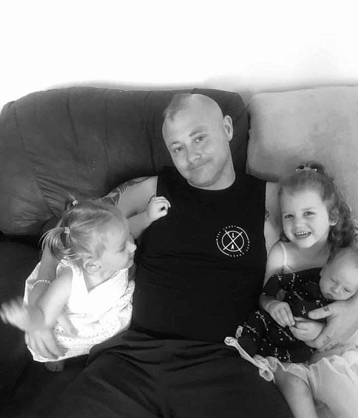 Alexander is registered to the contest to win money with this photo: arm, baby, black_and_white, child, comfort, elbow, face, flash_photography, gesture, happy, human_body, joy, lap, leg, monochrome_photography, muscle, person, shorts, smile, style