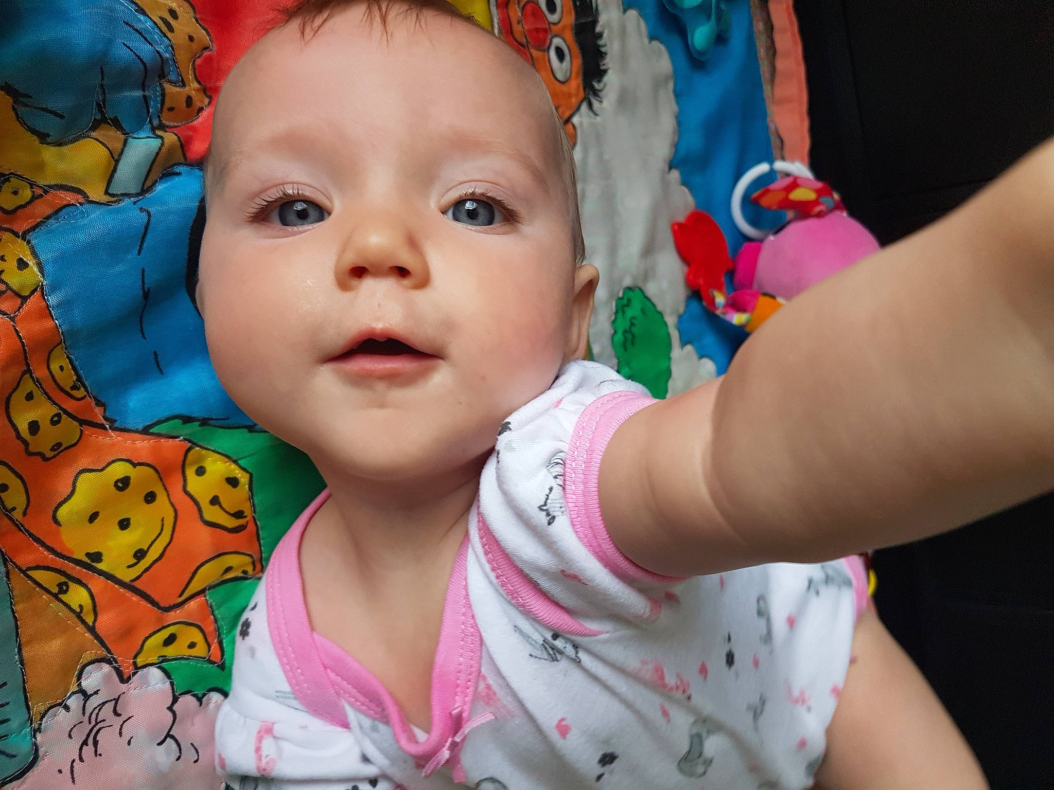 Cynthia is registered to the contest to win money with this photo: arm, baby_products, blue, cheek, clothing, eye, face, finger, fun, green, hair, hairstyle, head, human, lip, nature, people, person, product, vertebrate