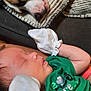 Kiba joined the competition — help win amazing prizes! animal, baby, bond, child, closeup, collar, cozy, cushion, dog, face, green_clothing, human, indoor, mittens, peaceful, pet, relaxation, resting, sleeping, soft_texture