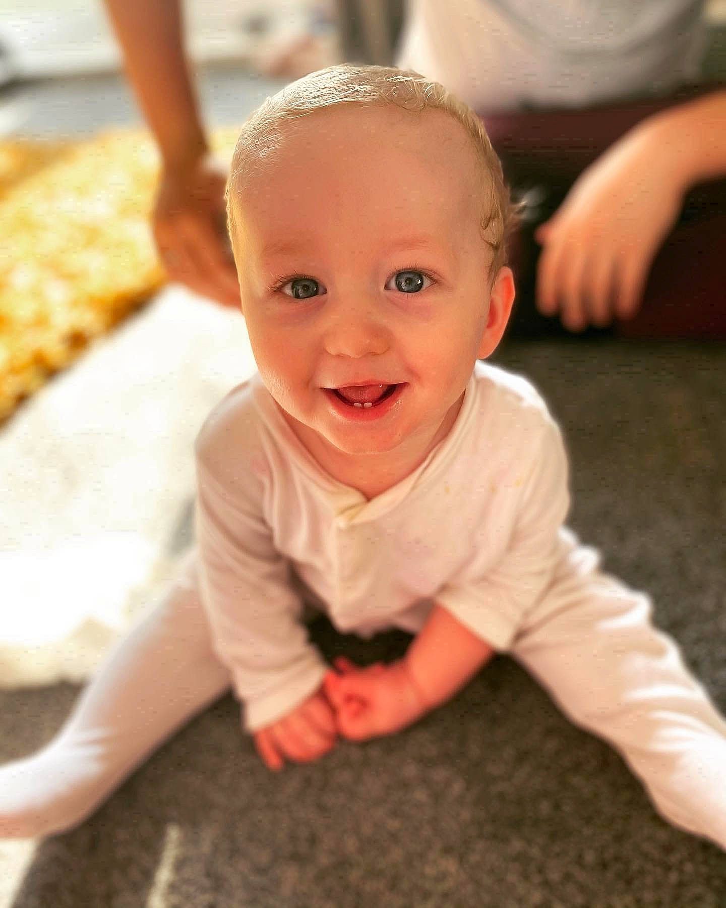 Colby is registered to the contest to win money with this photo: baby, baby_toddler_clothing, cheek, crawling, eye, finger, floor, flooring, fun, happy, hardwood, iris, joy, mouth, nose, person, skin, sleeve, smile, toddler