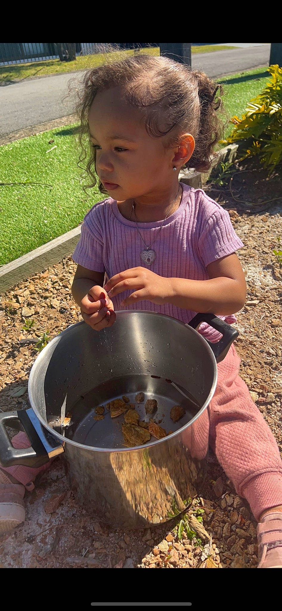Ellayna is registered to the contest to win money with this photo: child, cooking, cookware_and_bakeware, green, person, plant, soil, t_shirt, toddler