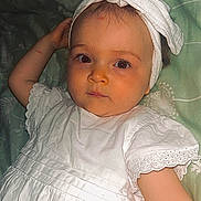 élaïa participe au concours pour gagner de l'argent avec cette photo : baby, bed, blanket, child, comfortable, cute, expression, face, headband, indoor, infant, looking_at_camera, lying_down, person, portrait, sleepwear, soft_toys, toy, white_dress, young_child