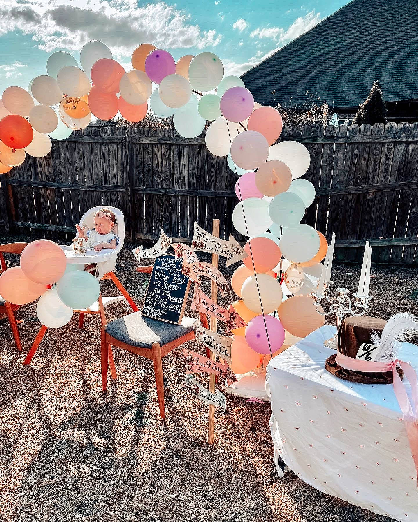 Aniya Alexander is registered to the contest to win money with this photo: balloon, chair, cloud, decoration, event, grass, happy, leisure, magenta, outdoor_table, party, party_supply, person, petal, pink, sky, spring, sweetness, table, tablecloth