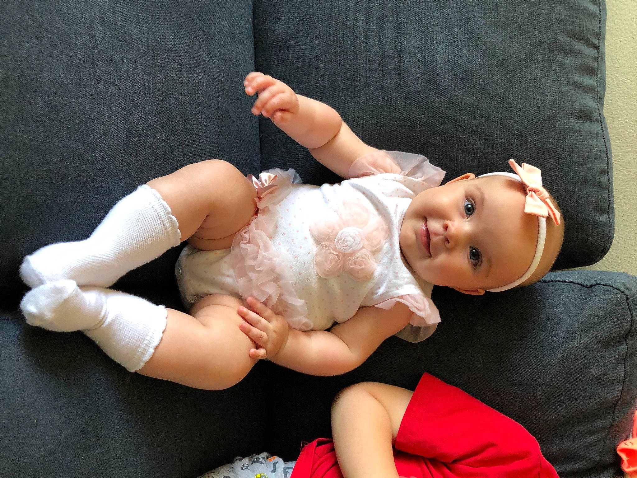 Mea joined the competition — help win amazing prizes! abdomen, baby, baby_toddler_clothing, barefoot, child, comfort, dress, finger, flash_photography, foot, happy, headpiece, human_body, human_leg, knee, lap, person, skin, sock, thigh
